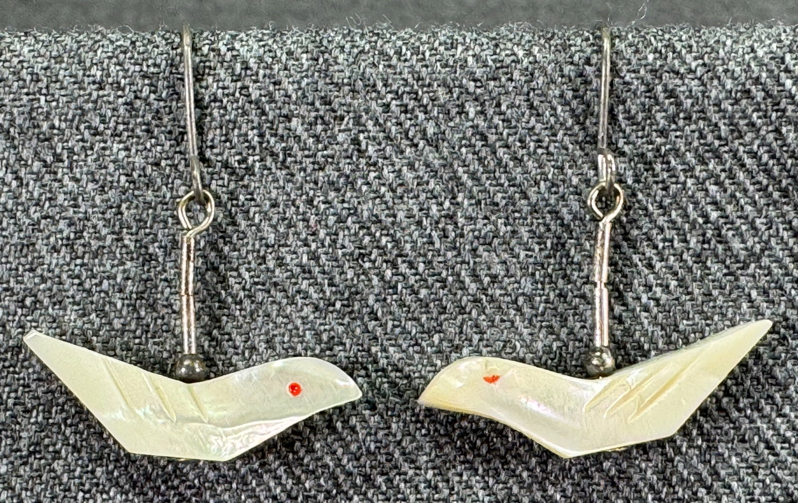 Vintage Native American MOP bird fetish liquid silver hook earrings: Vintage Native American MOP bird fetish liquid silver hook earrings. Unmarked. For measures please refer to the pictures taken with a measuring tape. Weight: 2.72 Grams. IN HOUSE Estimated* SHIPPING &