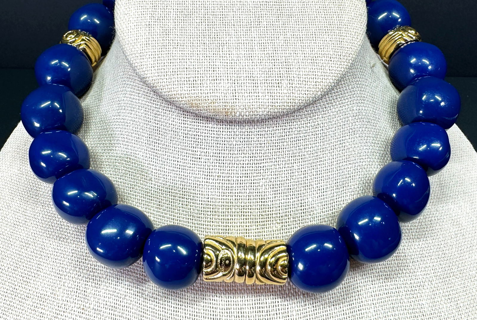 Vintage Givenchy blue plastic & goldtone metal beaded choker collar necklace.: Vintage Givenchy blue plastic & goldtone metal beaded choker collar necklace. Marked. Rau Klikit clasp. For measures please refer to the pictures taken with a measuring tape. Weight: 100 Grams. This i