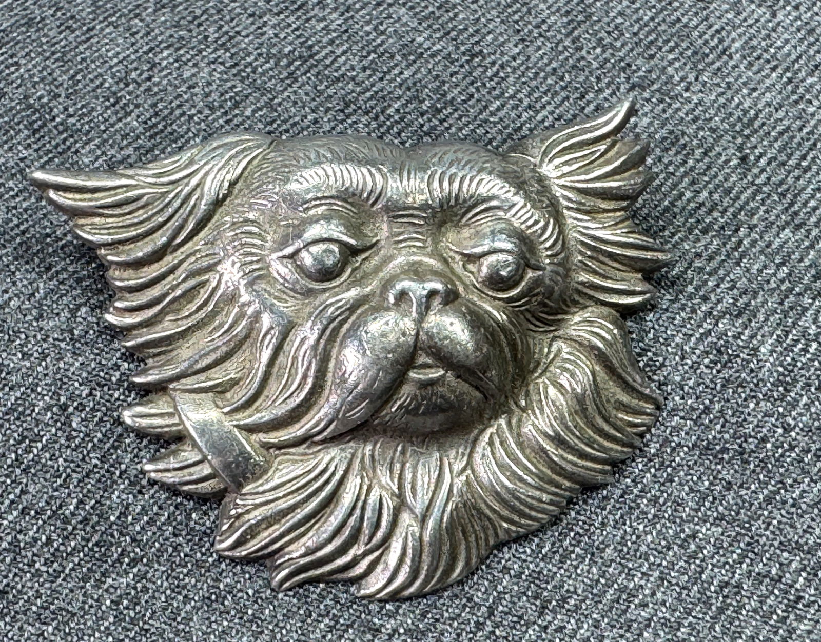 Vintage MCM pewter dog puppy brooch pin. Marked E.A.R.: Vintage MCM pewter dog puppy brooch pin. Marked E.A.R. inside a diamond. For measures please refer to the pictures taken with a measuring tape. Weight: 22.85 Grams. IN HOUSE Estimated* SHIPPING & HAND