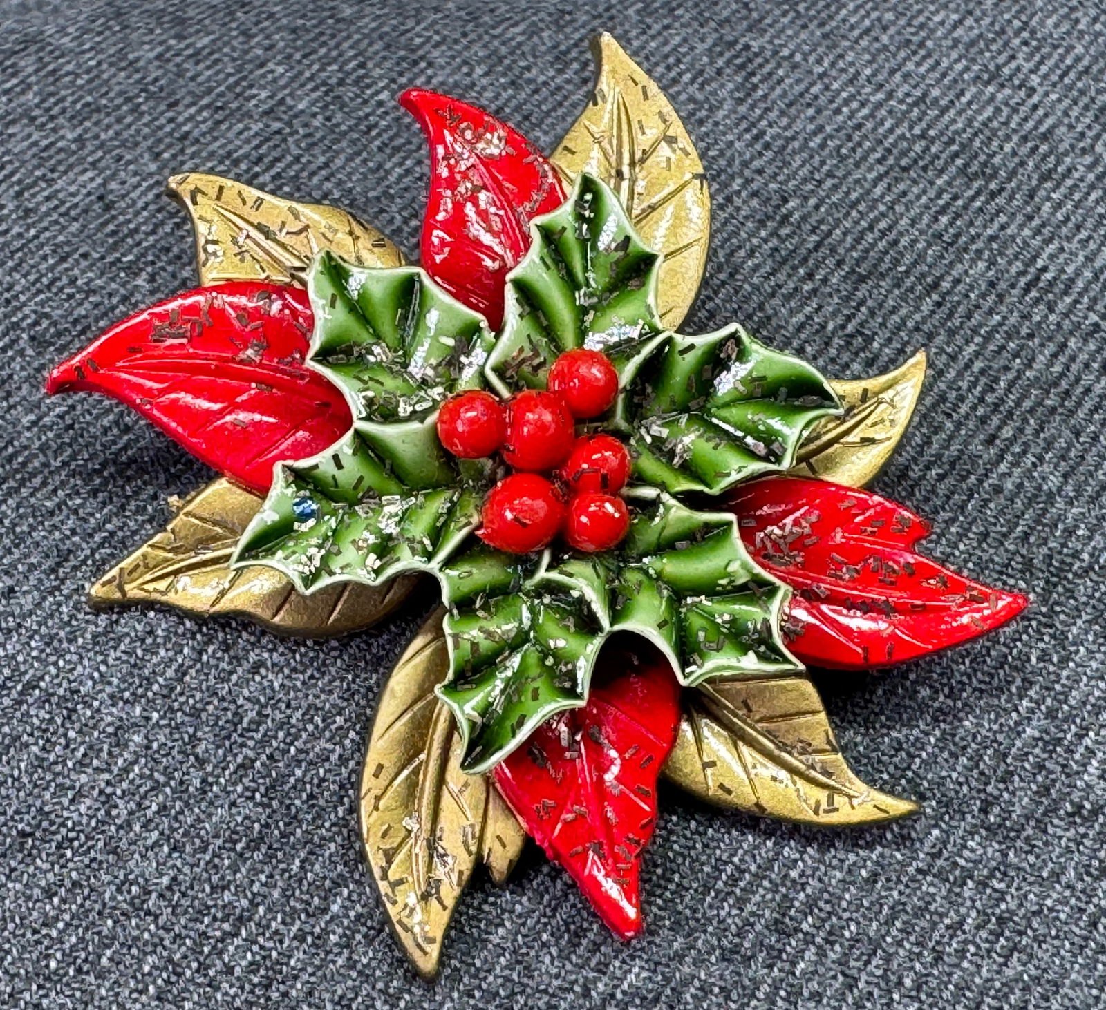 Vintage Christmas poinsettia with Our Lady medal on back plastic brooch pin (1 of 6)