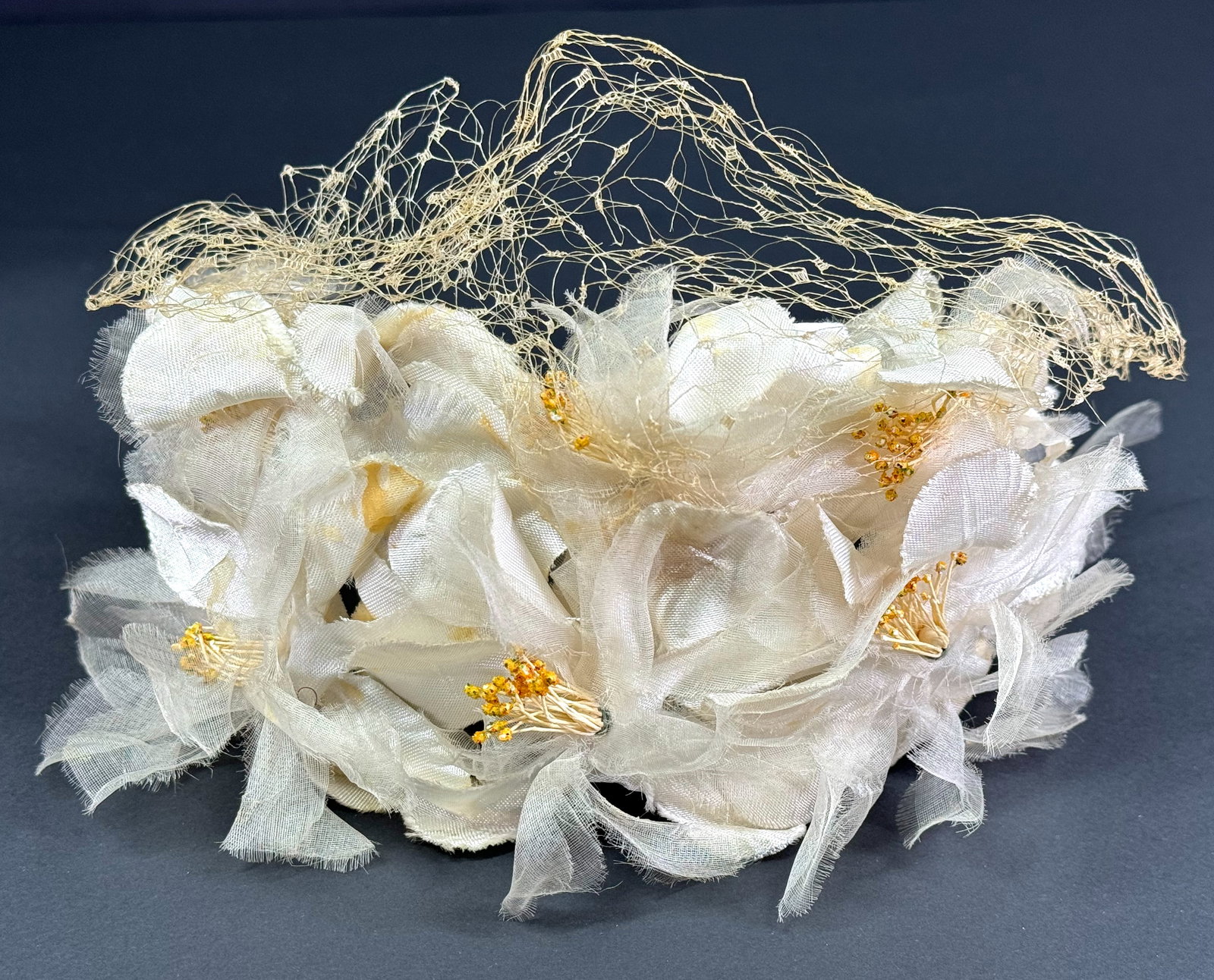 Vintage creamy fabric flowers headband hat with net.: Vintage creamy fabric flowers headband hat with net. It measures 11 inches long end to end and 3 1/2 inches widest. This is a NO RESERVE AUCTION: there are no hidden or confidential reserves, all acce