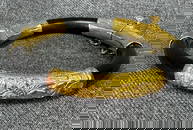 Vintage Chinese lacquered wood? gold-plated hinged bracelet. Marked