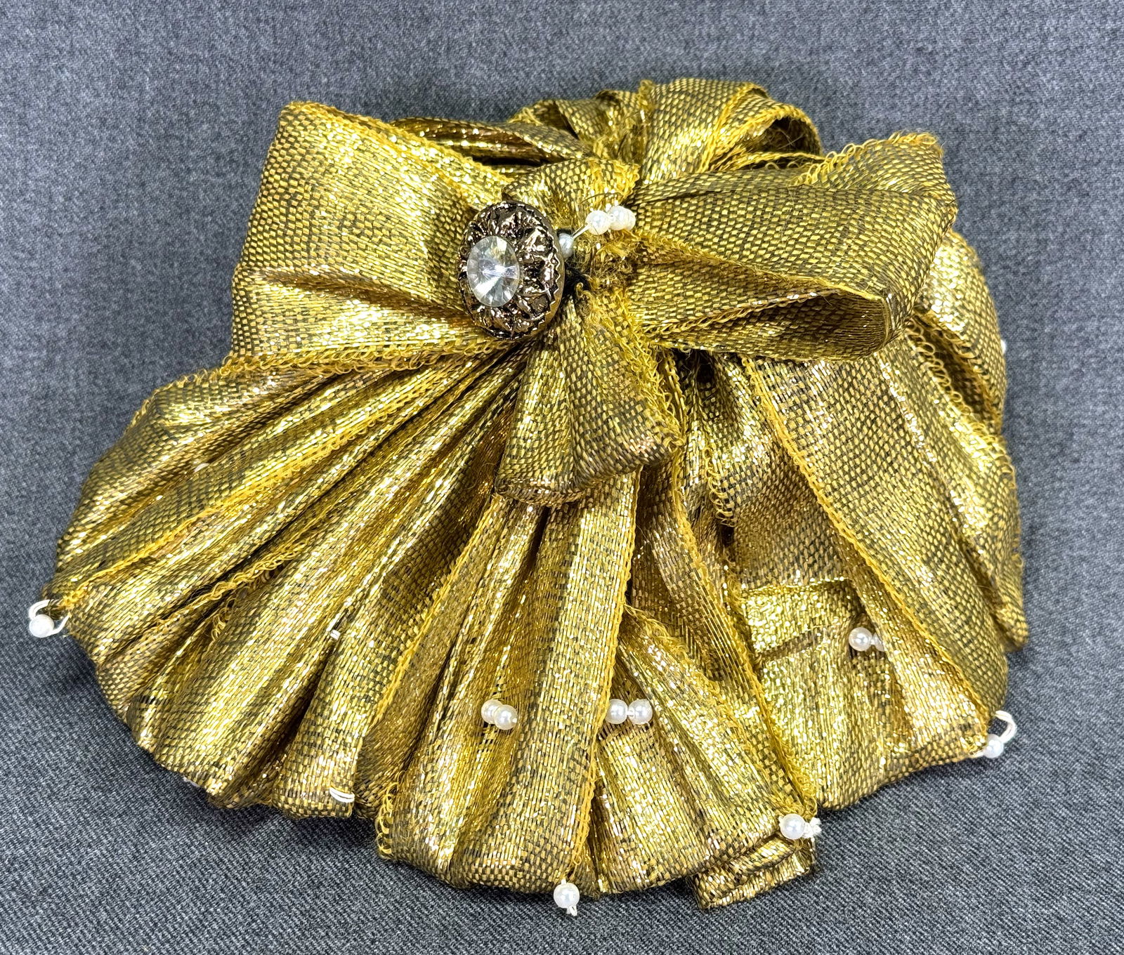 Vintage jeweled golden metallic fabric fascinator hat small applique: Vintage jeweled golden metallic fabric fascinator hat small applique . For measures please refer to the pictures taken with a measuring tape. IN HOUSE Estimated* SHIPPING & HANDLING COST WITHIN THE U.