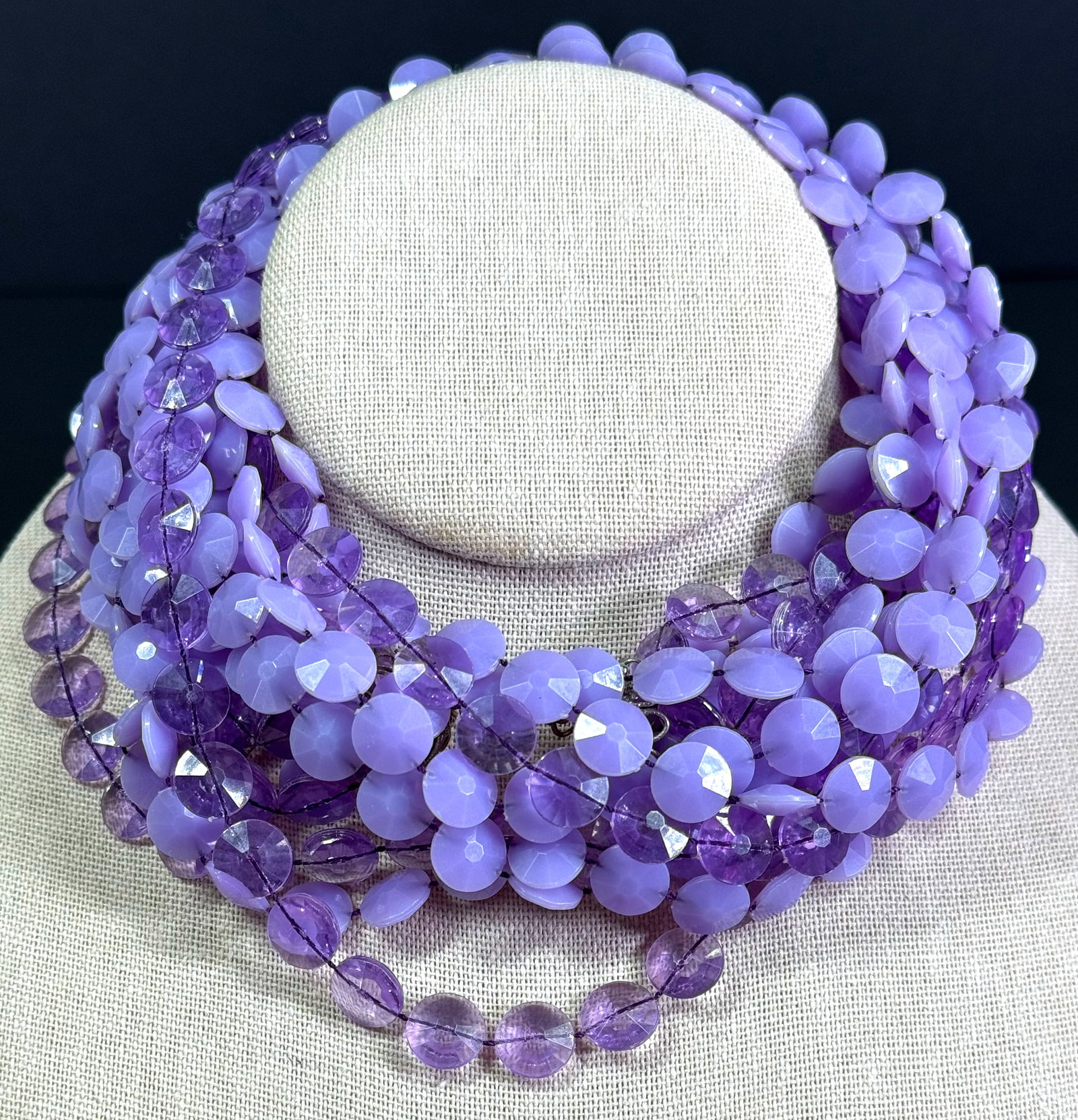Vintage mate & juicy lavender faceted thermoplastic multi strand necklace.: Vintage mate & juicy lavender faceted thermoplastic multi strand necklace. For measures please refer to the pictures taken with a measuring tape. Weight: 90 Grams. This is a NO RESERVE AUCTION: there 