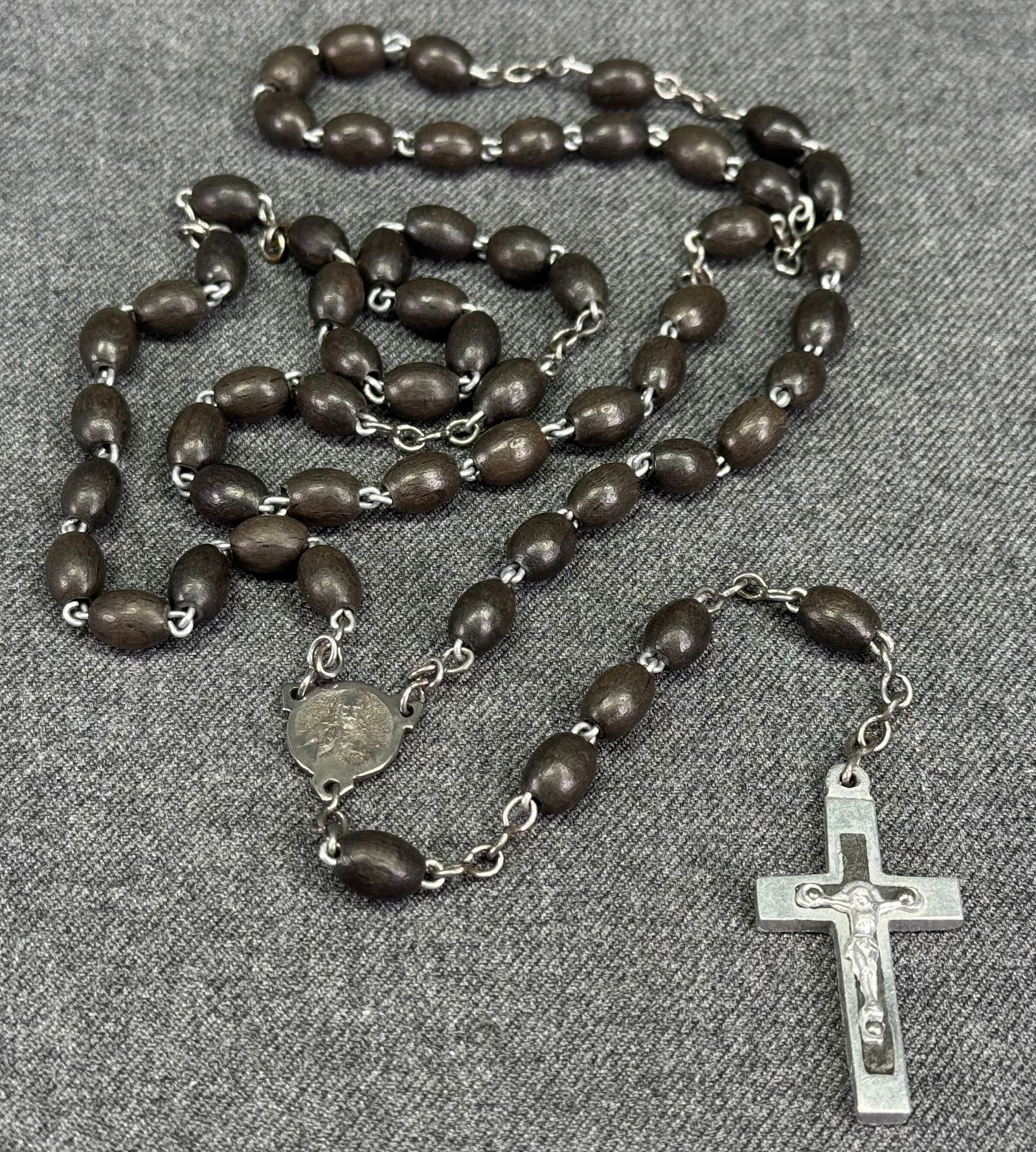 Vintage French ebony wood, silvertoned metal rosary. Marked France on medal: Vintage Italian milky plastic, silvertoned metal rosary. Made in Italy metal label. For measures please refer to the pictures taken with a measuring tape. Weight: 15 Grams. IN HOUSE Estimated* SHIPPIN