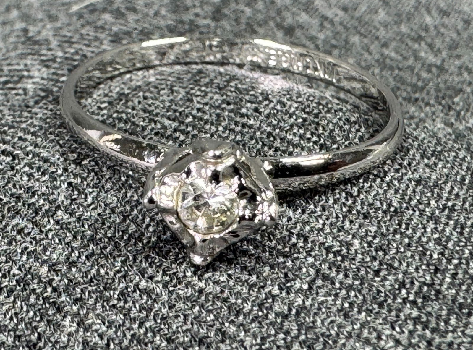 Vintage CZ 18KT heavy gold-filled metal ring.: Vintage CZ 18KT heavy gold-filled metal ring. Marked 18KT HGF. For measures please refer to the pictures taken with a measuring tape. Weight: 2 Grams. IN HOUSE Estimated* SHIPPING & HANDLING COST WITH