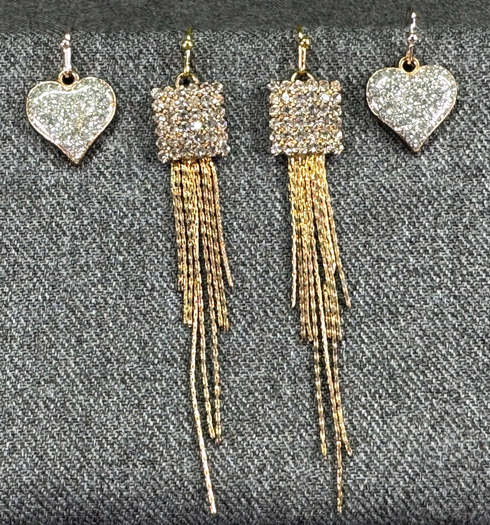 Vintage goldtoned metal glitter heart & rhinestones with fringe hook earrings.: Vintage goldtoned metal glitter heart & rhinestones with fringe hook earrings. Unmarked. For measures please refer to the pictures taken with a measuring tape. Weight: 10 Grams. IN HOUSE Estimated* SH