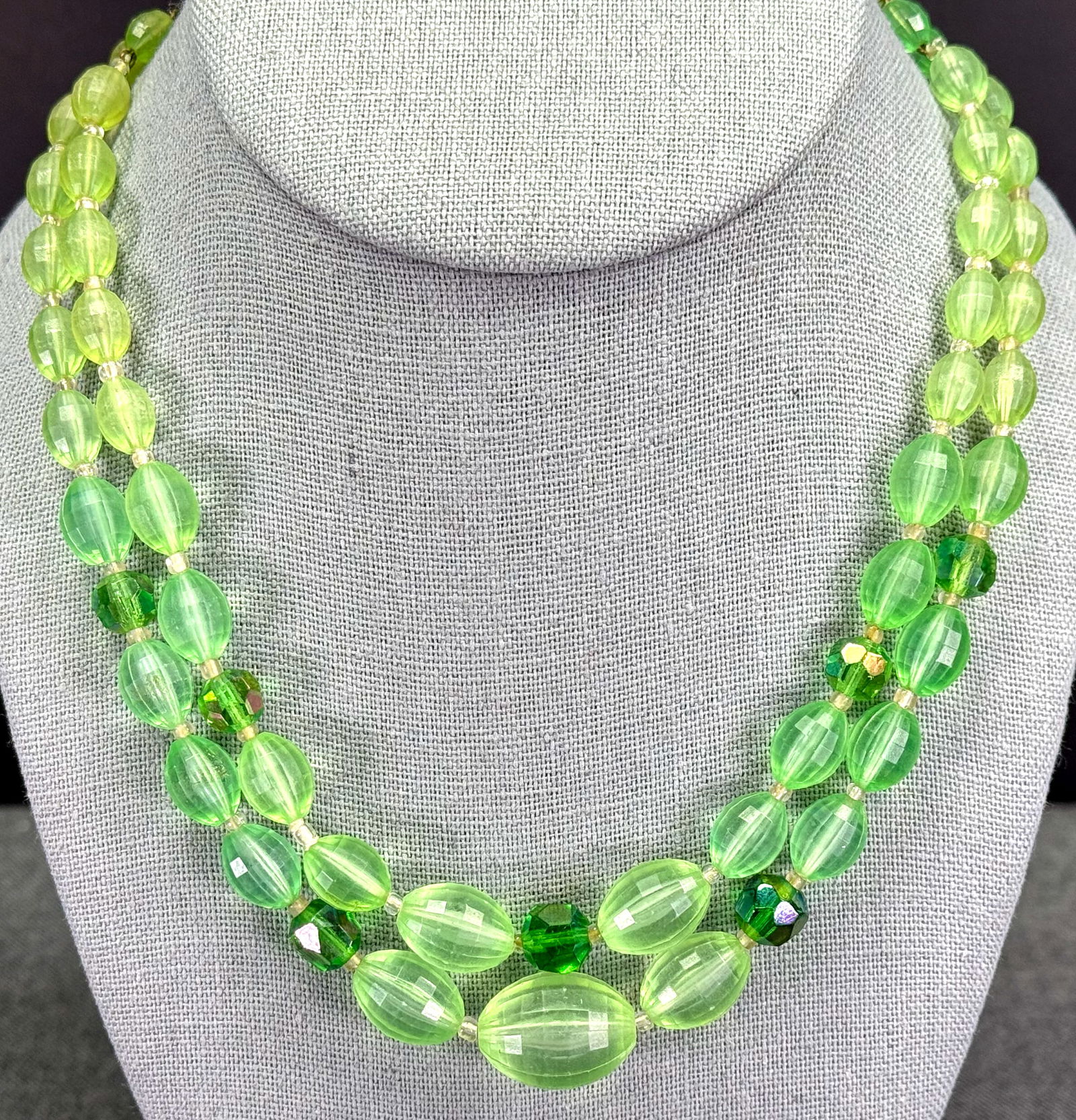 Vintage Japan AB crystals and juicy plastic greenish beads two strands collar necklace: Vintage Japan AB crystals and juicy plastic greenish beads two strands collar necklace. Marked. For measures please refer to the pictures taken with a measuring tape. Weight: 30 Grams. This is a NO RE