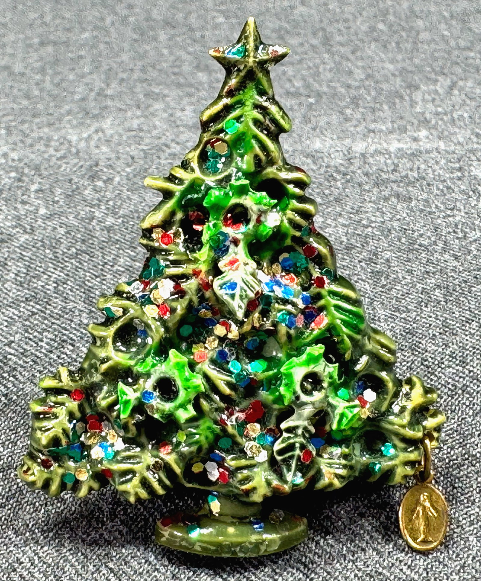 Vintage Our Lady tiny medal dangle glittery plastic Christmas tree brooch. (1 of 9)