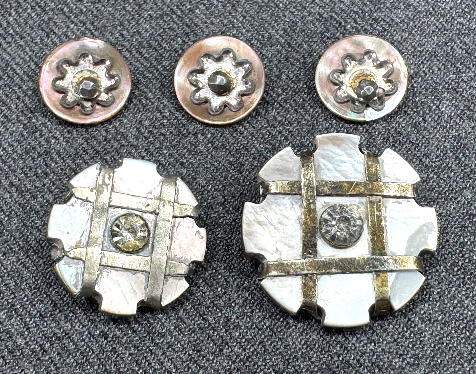 Antique assorted mother and daughter MOP & rhinestones and MOP & cut steel buttons: Antique assorted mother and daughter MOP & rhinestones and MOP & cut stell buttons. Unmarked. For measures please refer to the pictures taken with a measuring tape. Weight: 9 Grams. This is a NO RESER
