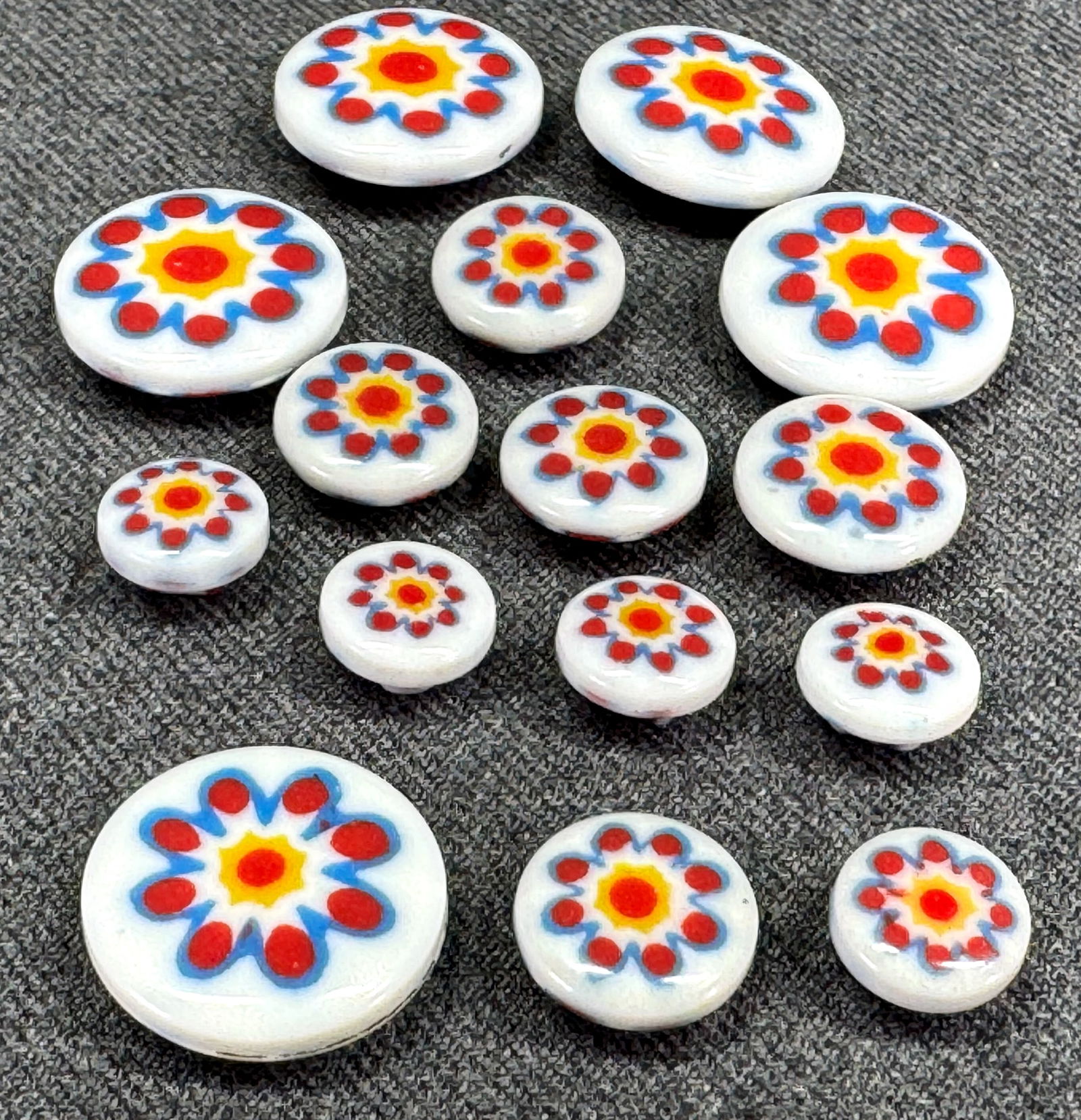 Vintage flower power white assorted size millefiori plastic buttons. Lot of 15. Unused: Vintage flower power white assorted size millefiori plastic buttons. Lot of 10. Unused For measures please refer to the pictures taken with a measuring tape. IN HOUSE Estimated* shipping and handling