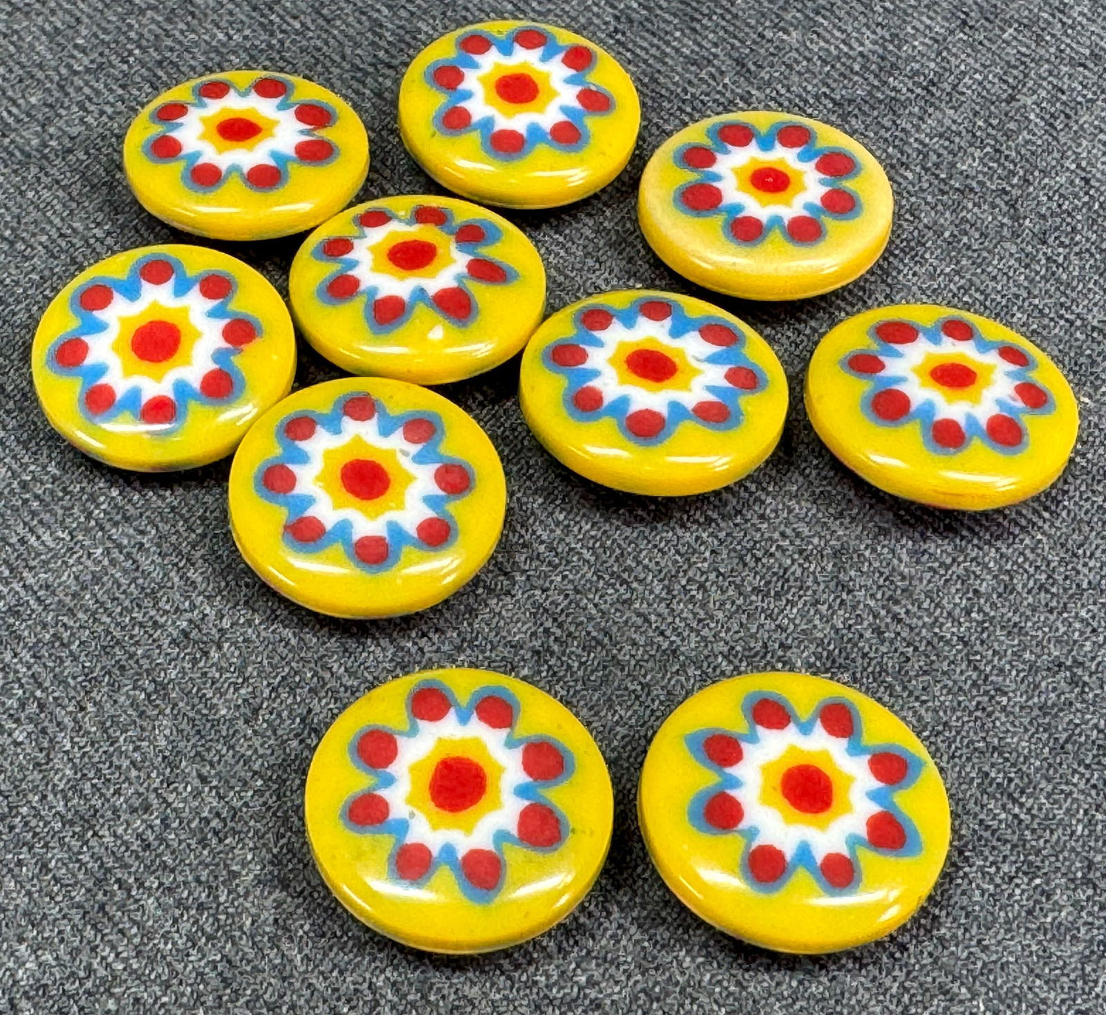 Vintage flower power yellow millefiori plastic buttons. Lot of 10. Unused: Vintage flower power yellow millefiori plastic buttons. Lot of 10. Unused For measures please refer to the pictures taken with a measuring tape. IN HOUSE Estimated* shipping and handling cost within t