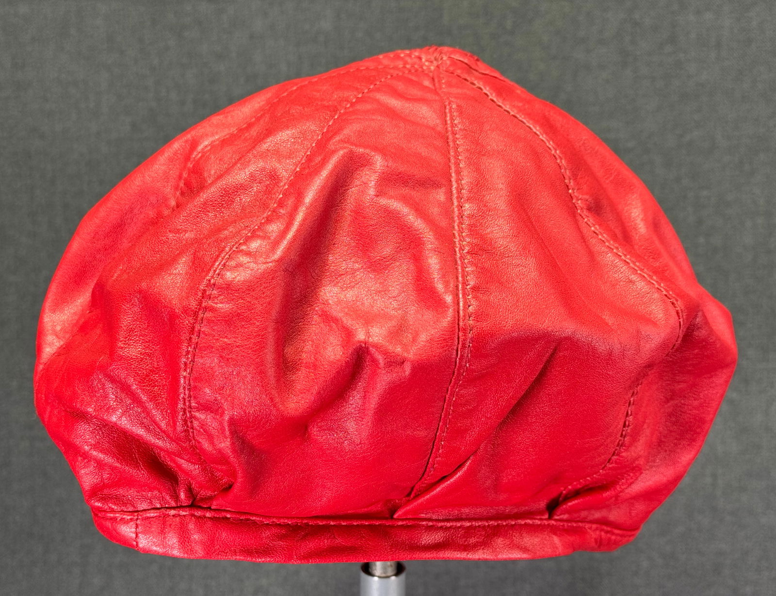 Vintage genuine red leather beanie hat: Vintage genuine red leather beanie hat. Unmarked. For measures please refer to the pictures taken with a measuring tape. Weight: 60 Grams IN HOUSE Estimated* SHIPPING & HANDLING COST WITHIN THE U.S. :
