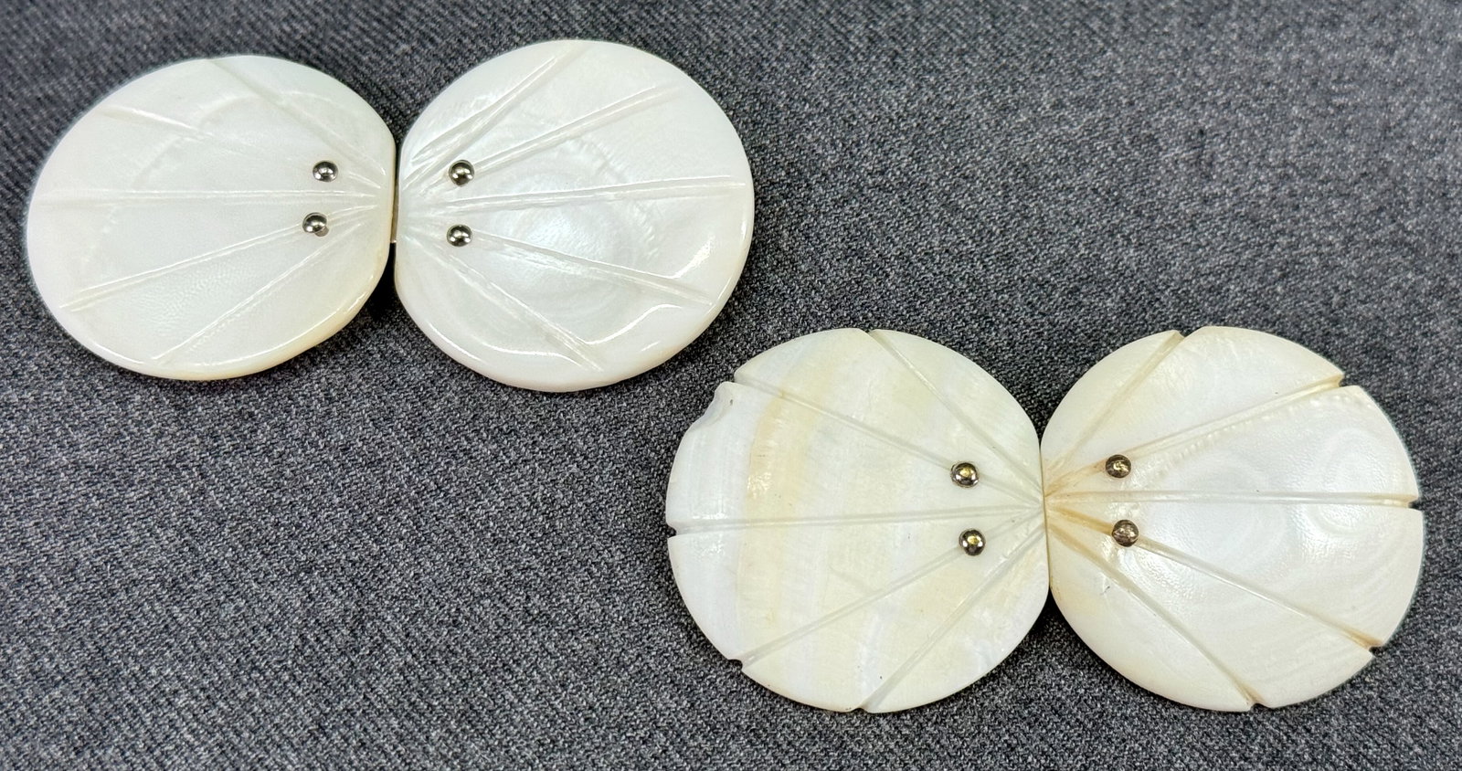 Antique carved mother of pearl belt buckles. Lot of 2: Antique carved mother of pearl belt buckles. Lot of 2. Unmarked. For measures please refer to the pictures taken with a measuring tape. Weight:49 Grams IN HOUSE Estimated* SHIPPING & HANDLING COST WIT