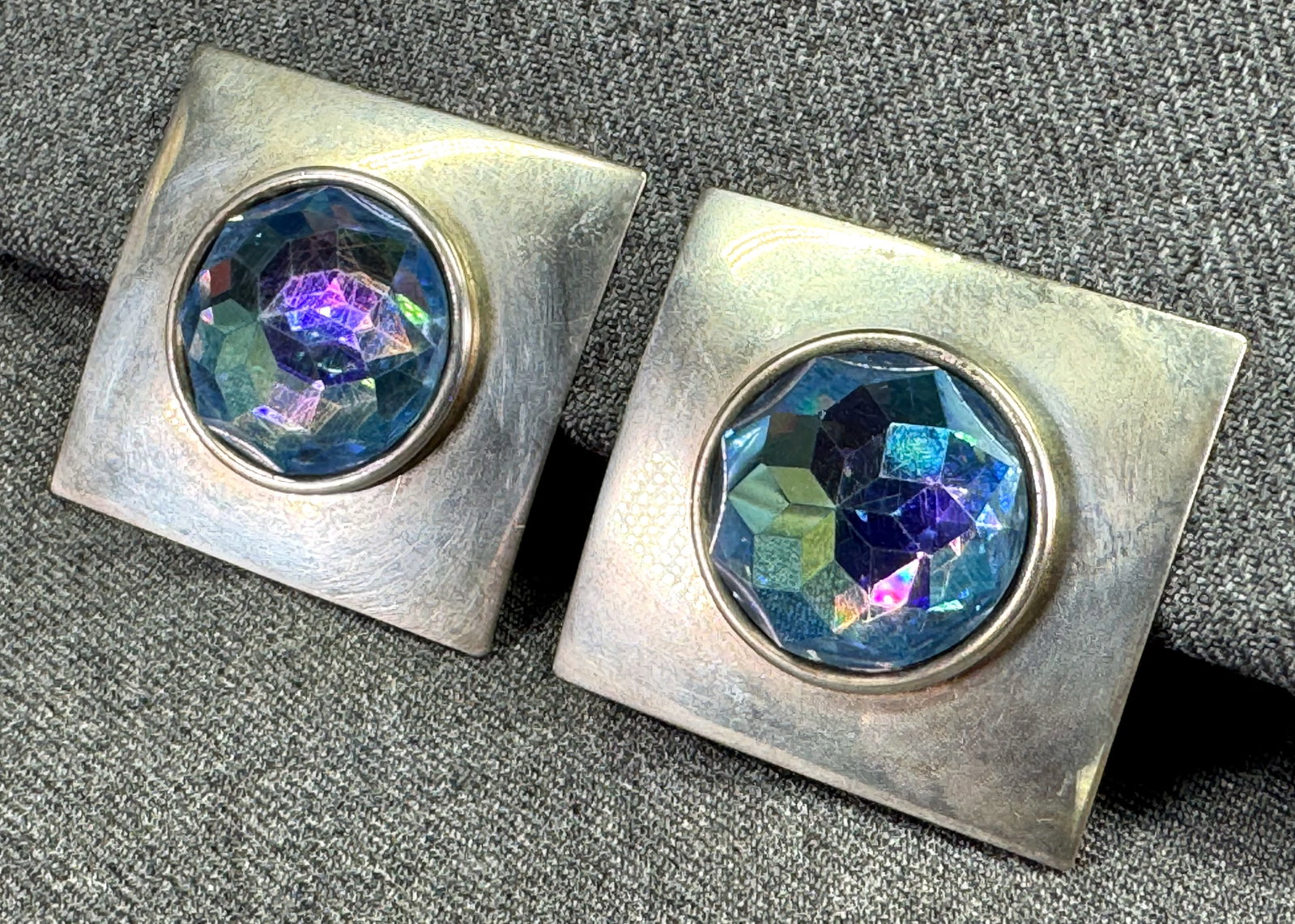 Vintage artsy dome AD crystal silvertoned oversized clip earrings: Vintage artsy dome AD crystal silvertoned oversized clip earrings. Unmarked. For measures please refer to the pictures taken with a measuring tape. Weight: 40 Grams. IN HOUSE Estimated* SHIPPING & HAN
