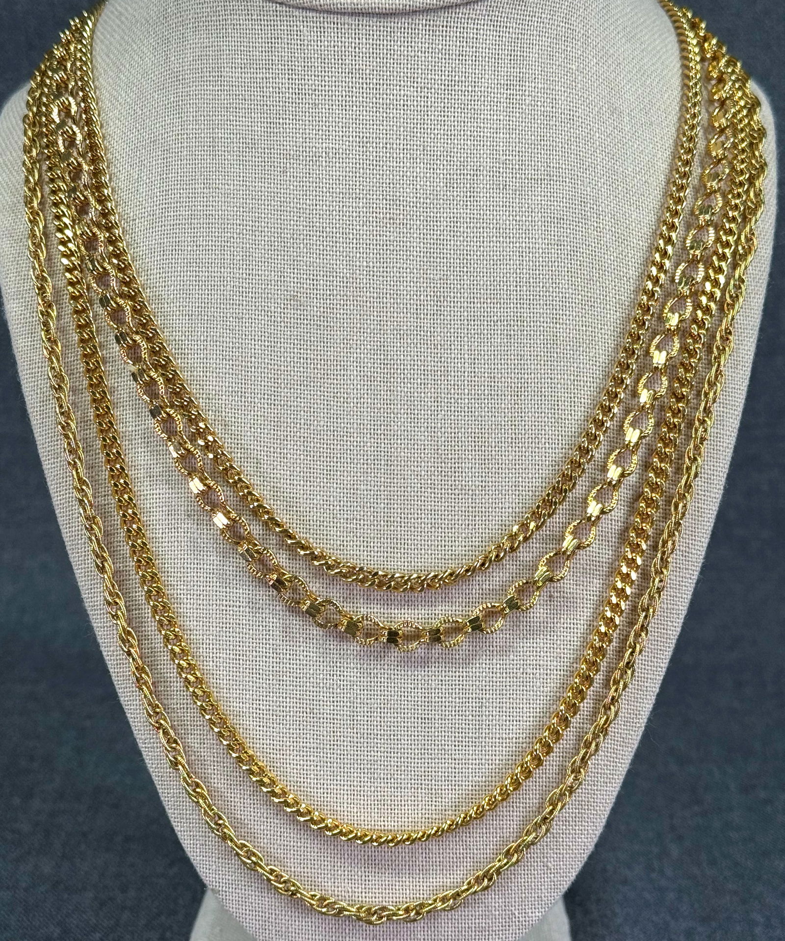 Vintage Monet multi strand chains goldtoned necklace: Vintage Monet multi strand chains goldtoned necklace. Marked. For measures please refer to the pictures taken with a measuring tape. Weight: 85 Grams. IN HOUSE Estimated* SHIPPING & HANDLING COST WITH