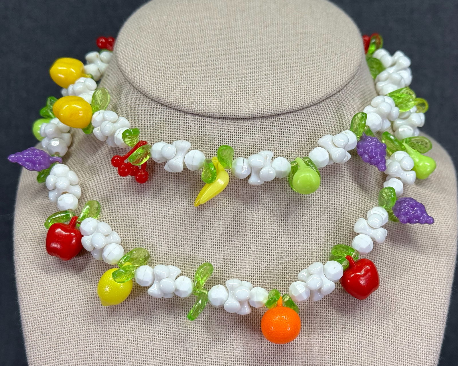 Vintage color plastic fruit salad necklace: Vintage plastic fruit salad necklace. Unmarked. For measures please refer to the pictures taken with a measuring tape. Weight: 36 Grams. IN HOUSE Estimated* SHIPPING & HANDLING COST WITHIN THE U.S. :