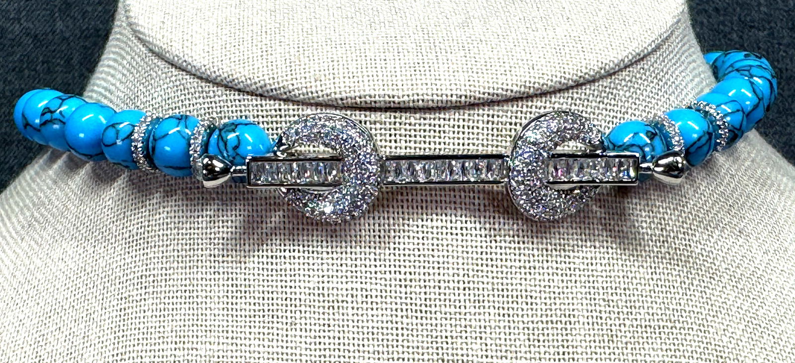 CZ silvertoned medallion turquoise resin beaded choker necklace: CZ silvertoned medallion turquoise resin beaded choker necklace. Unmarked. For measures please refer to the pictures taken with a measuring tape. Weight: 31 Grams. IN HOUSE Estimated* SHIPPING & HANDL