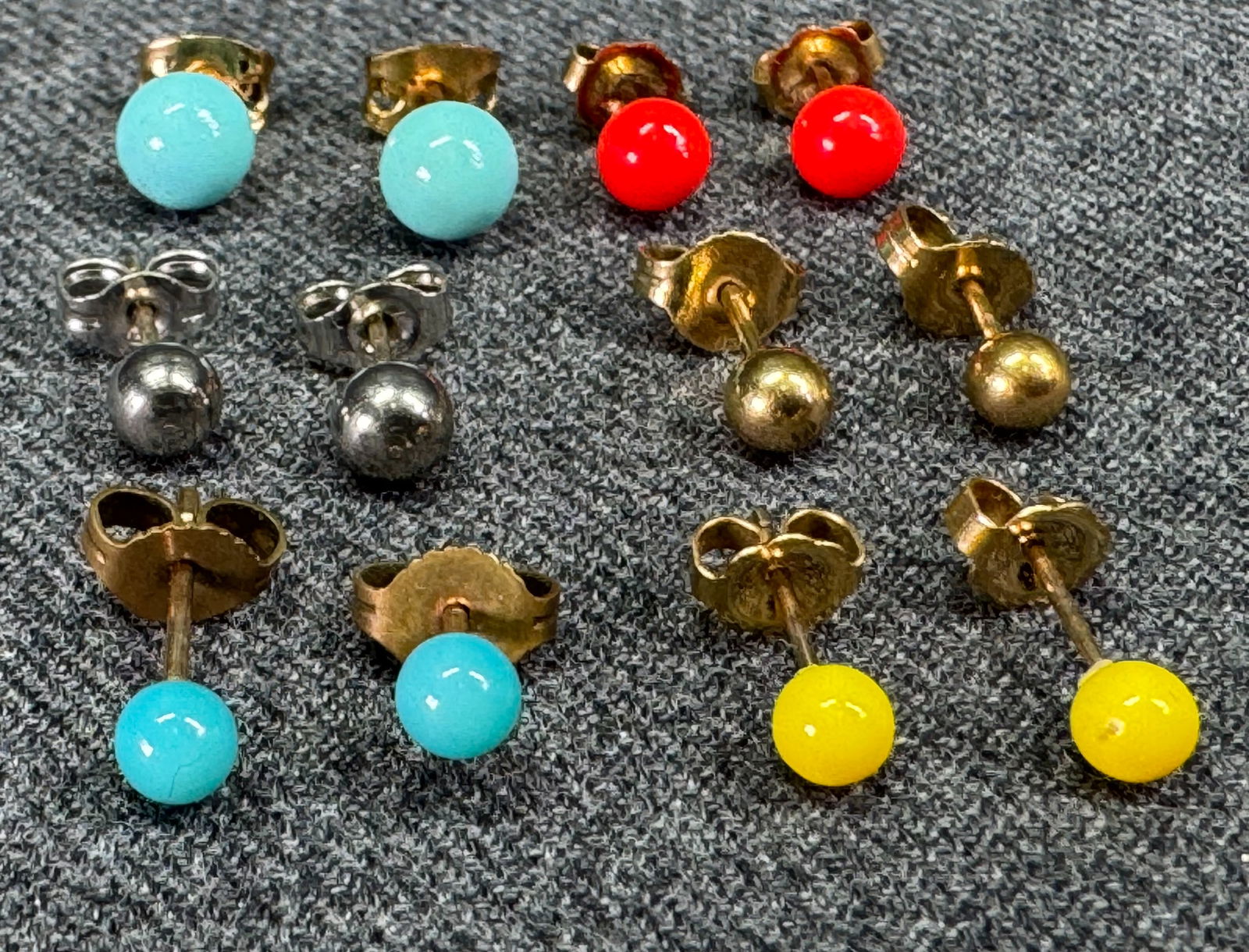 Assorted colors and materials ball bead stud earrings. Lot of 6: Assorted colors and materials ball bead stud earrings. Lot of 6. Unmarked. For measures please refer to the pictures taken with a measuring tape. Weight: 4 Grams. IN HOUSE Estimated* shipping and hand