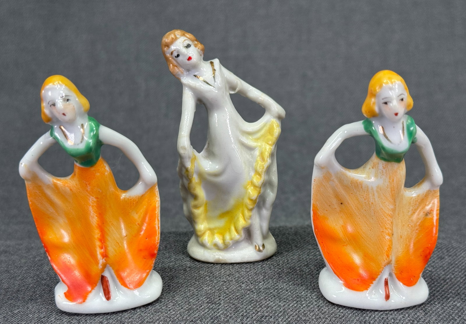 Vintage Japanese painted porcelain dancer miniature figurines. Lot of 3: Vintage Japanese painted porcelain dancer miniture figurines. Lot of 3. Marked. For measures please refer to the pictures taken with a measuring tape. IN HOUSE Estimated* SHIPPING & HANDLING COST WITH