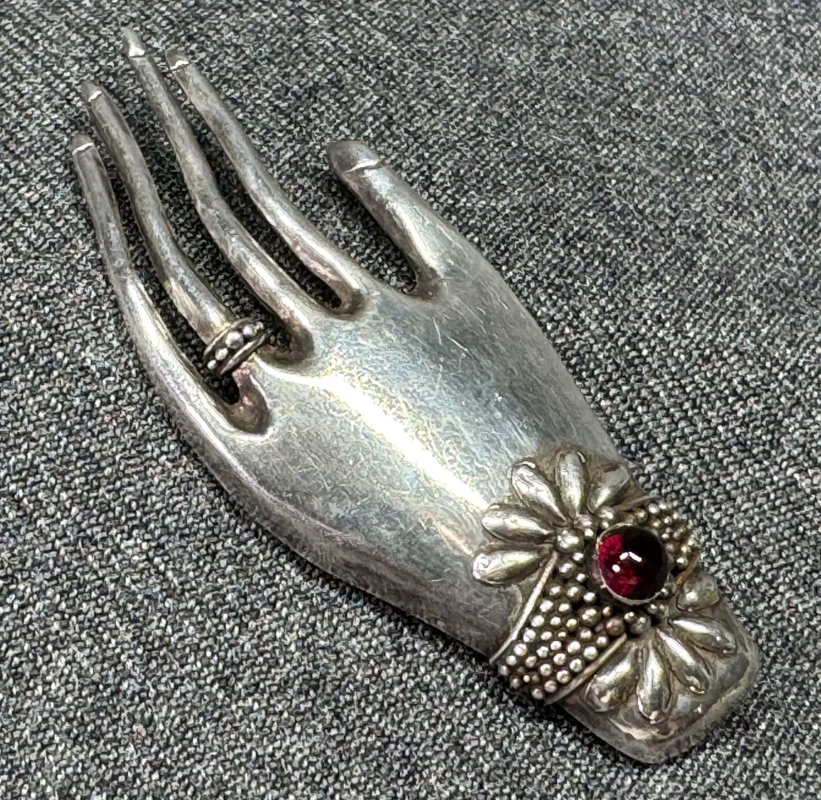 Vintage artsy sterling silver hand with ring and garnet bracelet brooch pin (1 of 10)