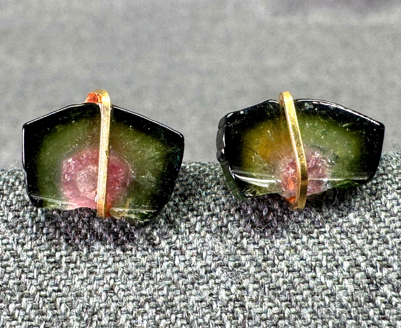 Artisan wrapped in goldtoned wire watermelon agate stone stud earrings: Artisan wrapped in goldtoned wire watermelon agate stone stud earrings. Unmarked. For measures please refer to the pictures taken with a measuring tape. Weight: 3 Grams. IN HOUSE Estimated* SHIPPING &