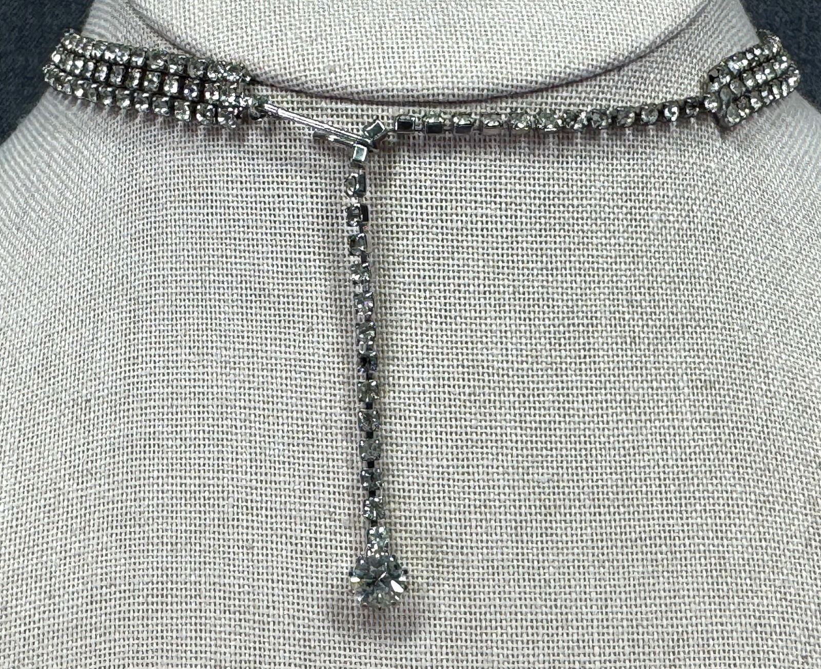 Vintage clear rhinestones silvertone metal 3 strands choker necklace: Vintage clear rhinestones silvertone metal 3 strands choker necklace. Unmarked. For measures please refer to the pictures taken with a measuring tape. Weight: 18 Grams. IN HOUSE Estimated* shipping an
