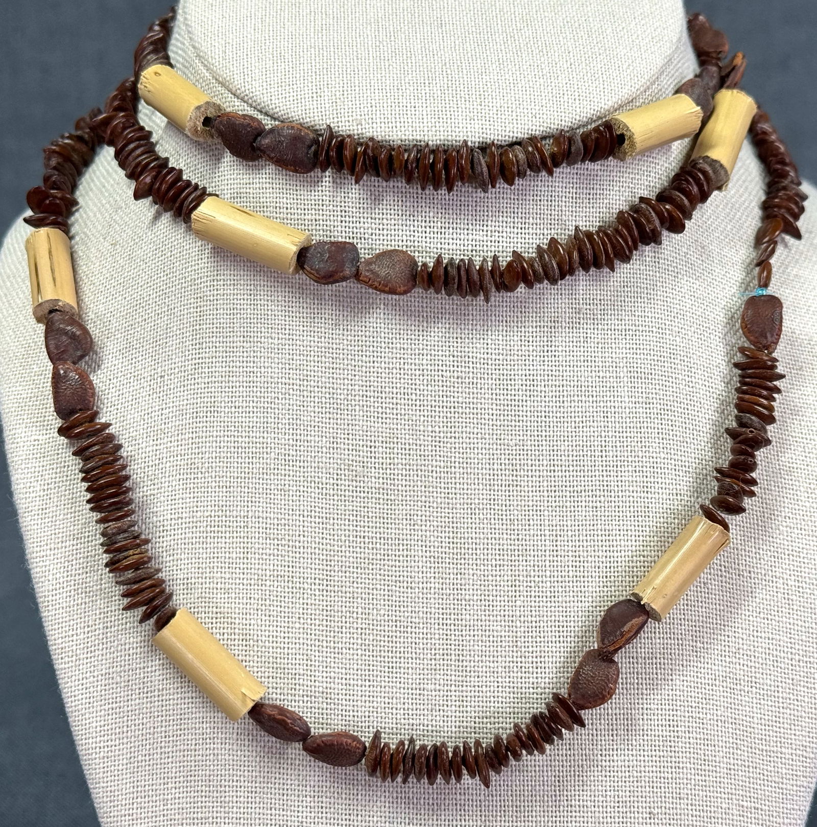 Vintage ethnic seeds and bamboo beads necklace: Vintage ethnic seeds and bamboo beads necklace. Unmarked. For measures please refer to the pictures taken with a measuring tape. Weight: 18 Grams. IN HOUSE Estimated* SHIPPING & HANDLING COST WITHIN T