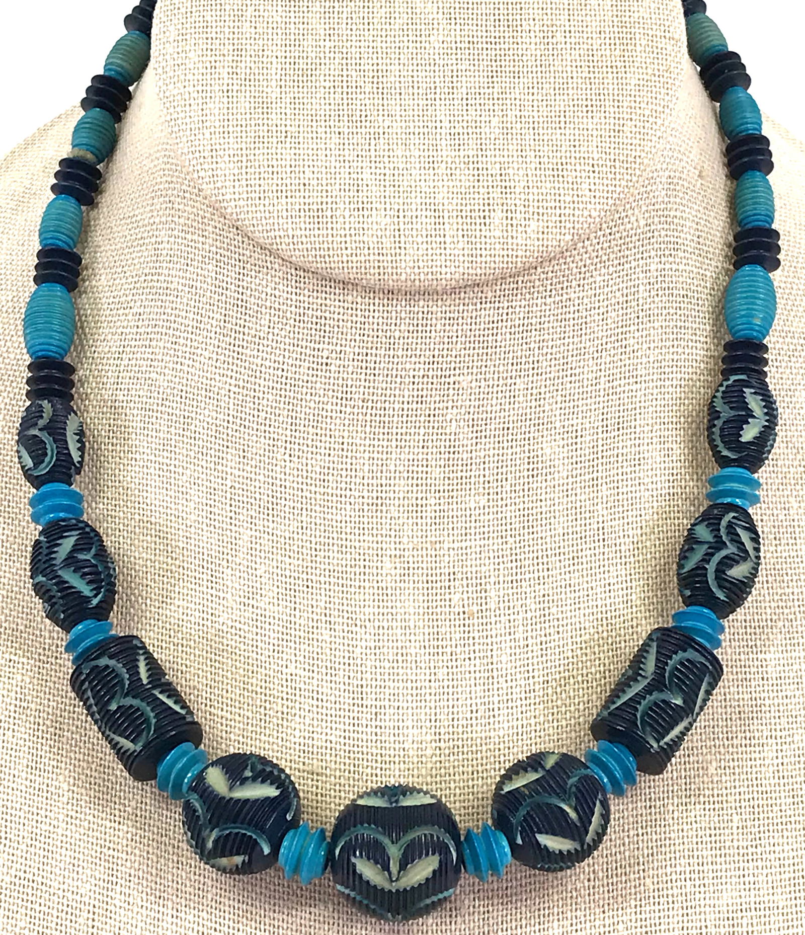 Art Deco Carved & Molded Plastic Collar Necklace: Art deco carved and molded creamy & clear and dark blue plastic collar necklace. It measures around 16 1/2 inches long end to end. For measures please refer to the picture taken with a measure tape. W