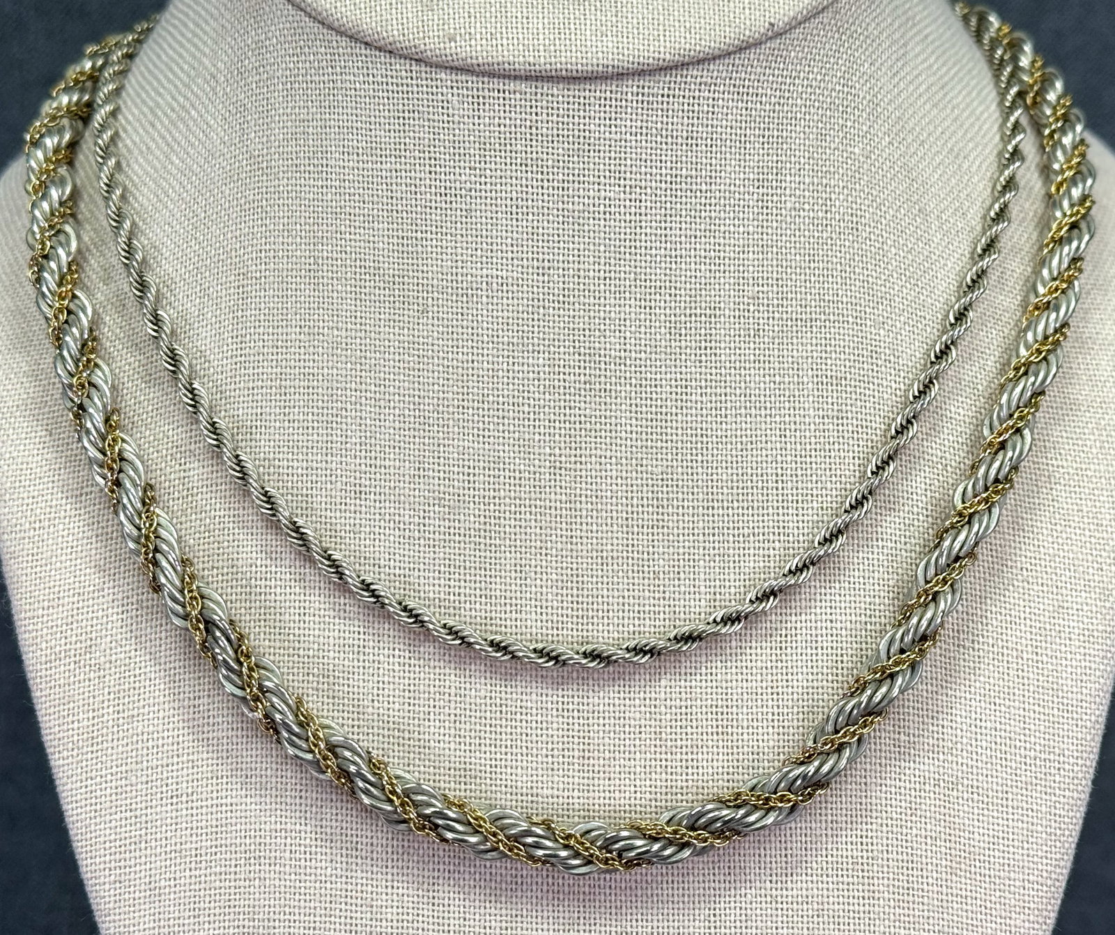 Vintage silvertoned & silvertoned and goldtoned rope chain necklaces: Vintage silvertoned & silvertoned and goldtoned rope chain necklaces. Both unmarked For measures please refer to the pictures taken with a measuring tape. Weight: 52 Grams IN HOUSE Estimated* SHIPPING