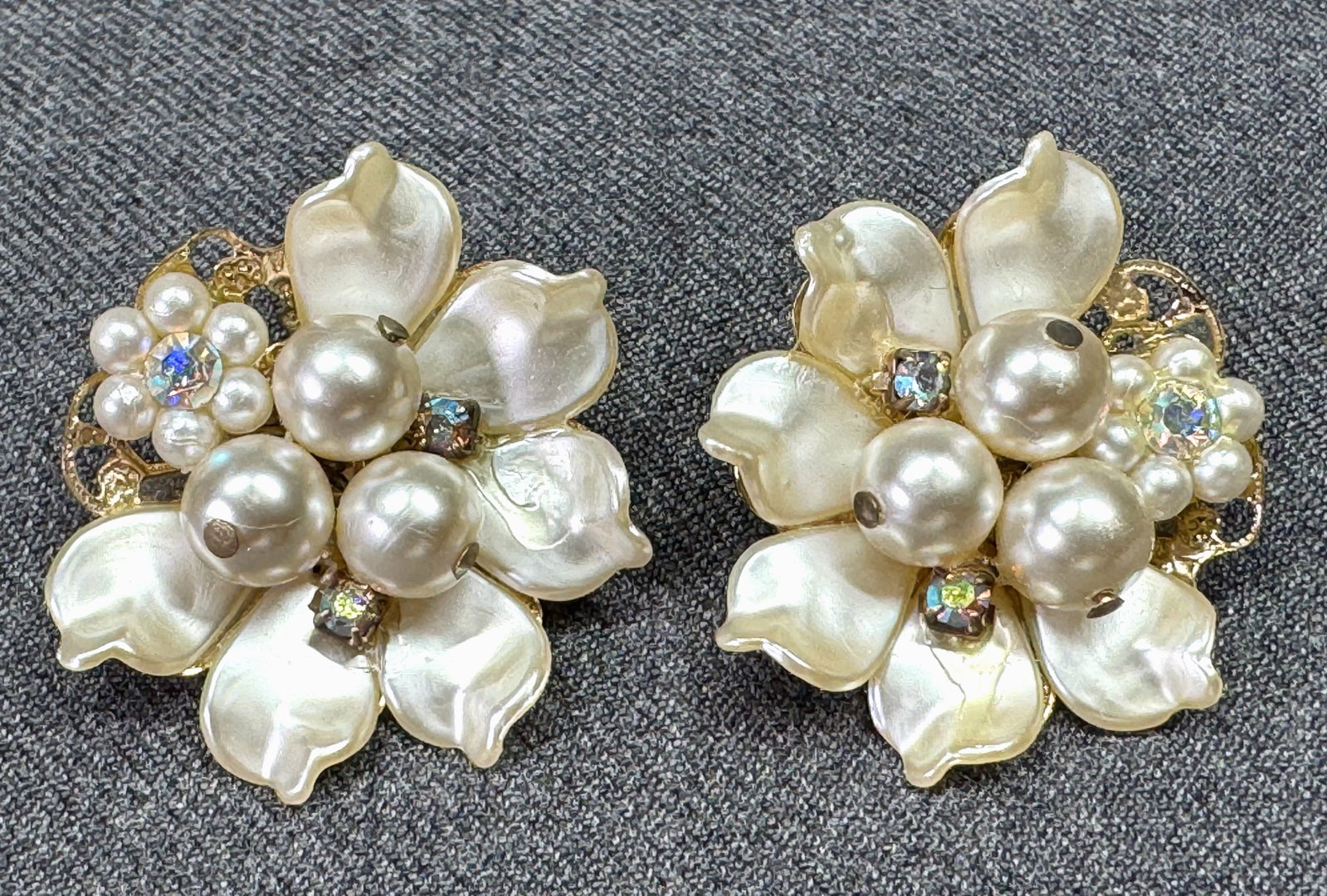 Vintage Haskell style Ab crystals, pearly beads goldt-toned clip on earrings: Vintage Haskell style Ab crystals, pearly beads goldt-toned clip on earrings. Unmarked. For measures please refer to the pictures taken with a measuring tape. Weight: 12 Grams. IN HOUSE Estimated* SHI