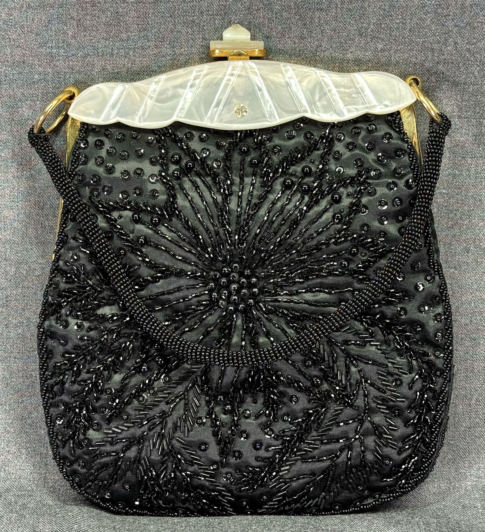 Vintage Silvercraft jeweled lucite frame hand beaded black purse bag: Vintage Silvercraft jeweled lucite frame hand beaded black purse bag. Fabric label. For measures please refer to the pictures taken with a measuring tape. IN HOUSE Estimated* SHIPPING & HANDLING COST