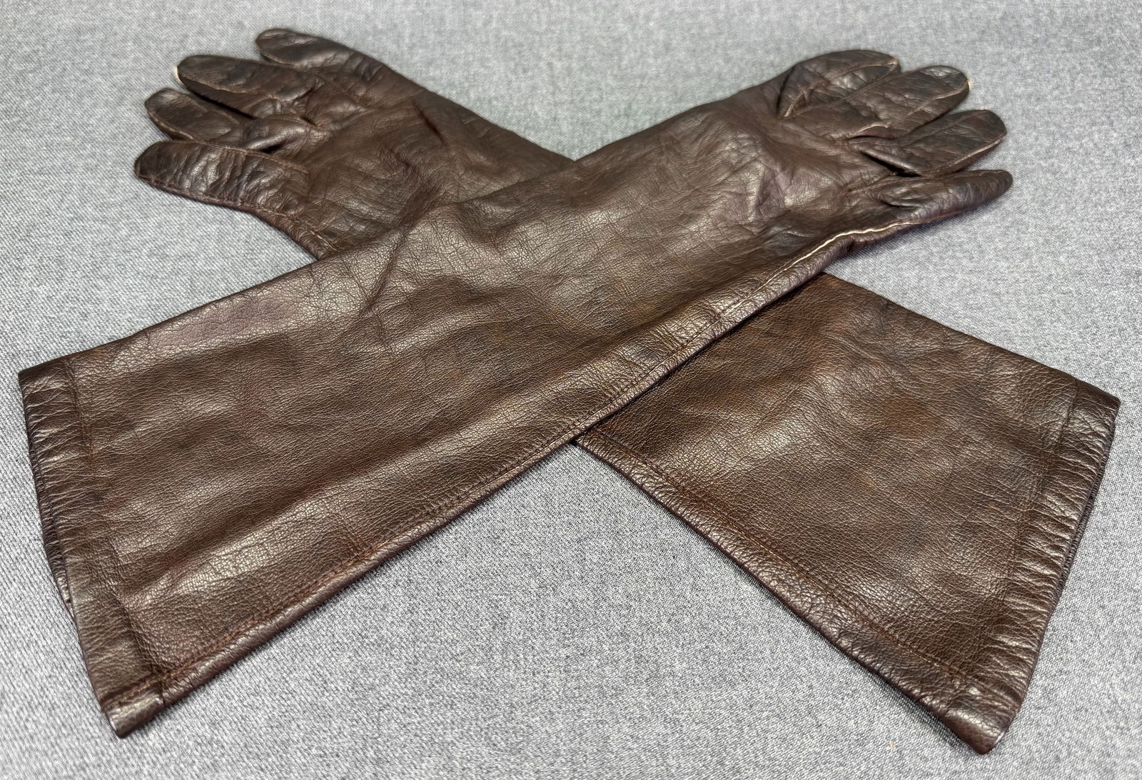 Vintage brown genuine leather lined in silk gloves. Made in France (1 of 6)