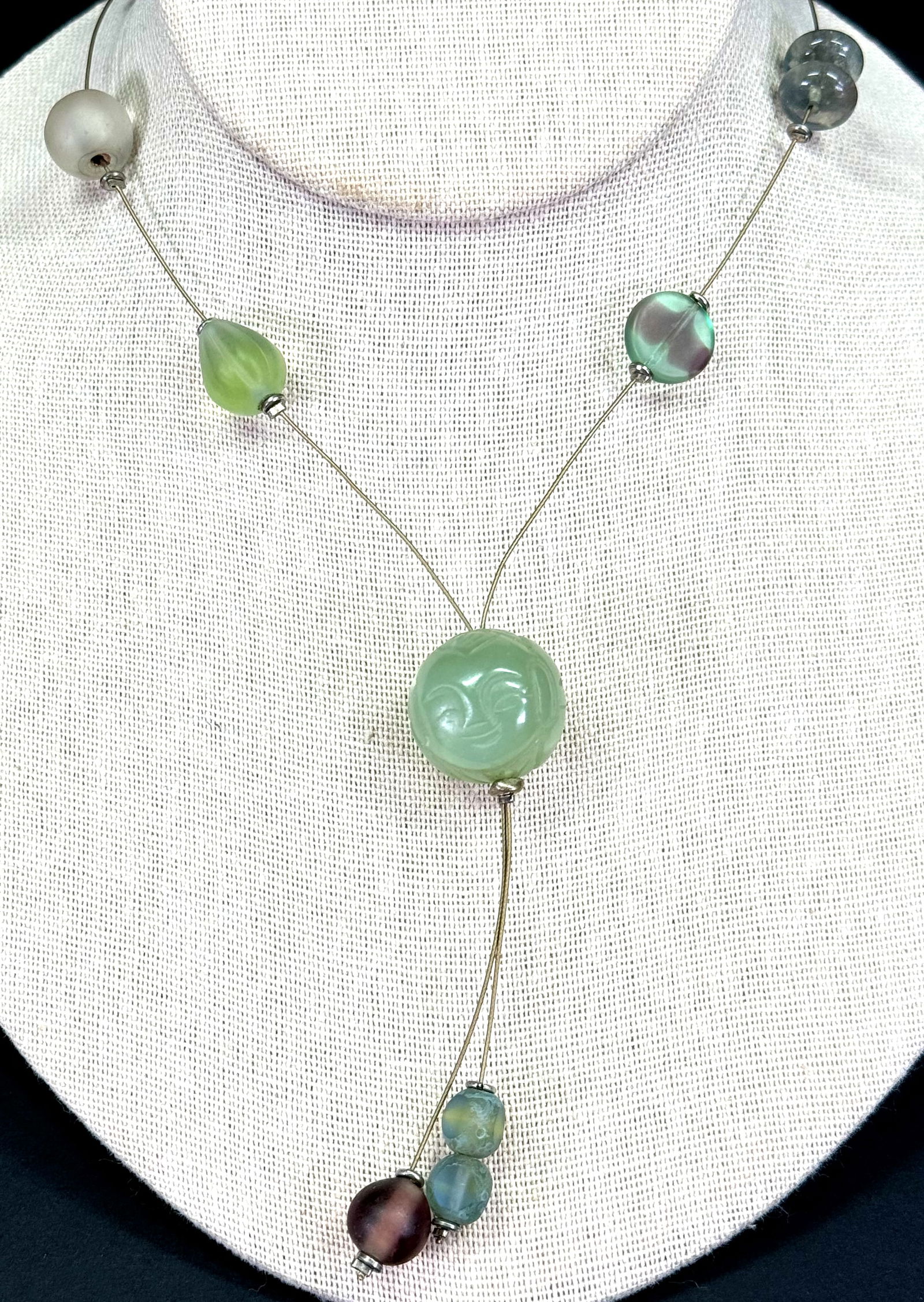 Artsy double sided face carved green stone,sliding glass beads, silvertone wire lariat necklace (1 of 10)