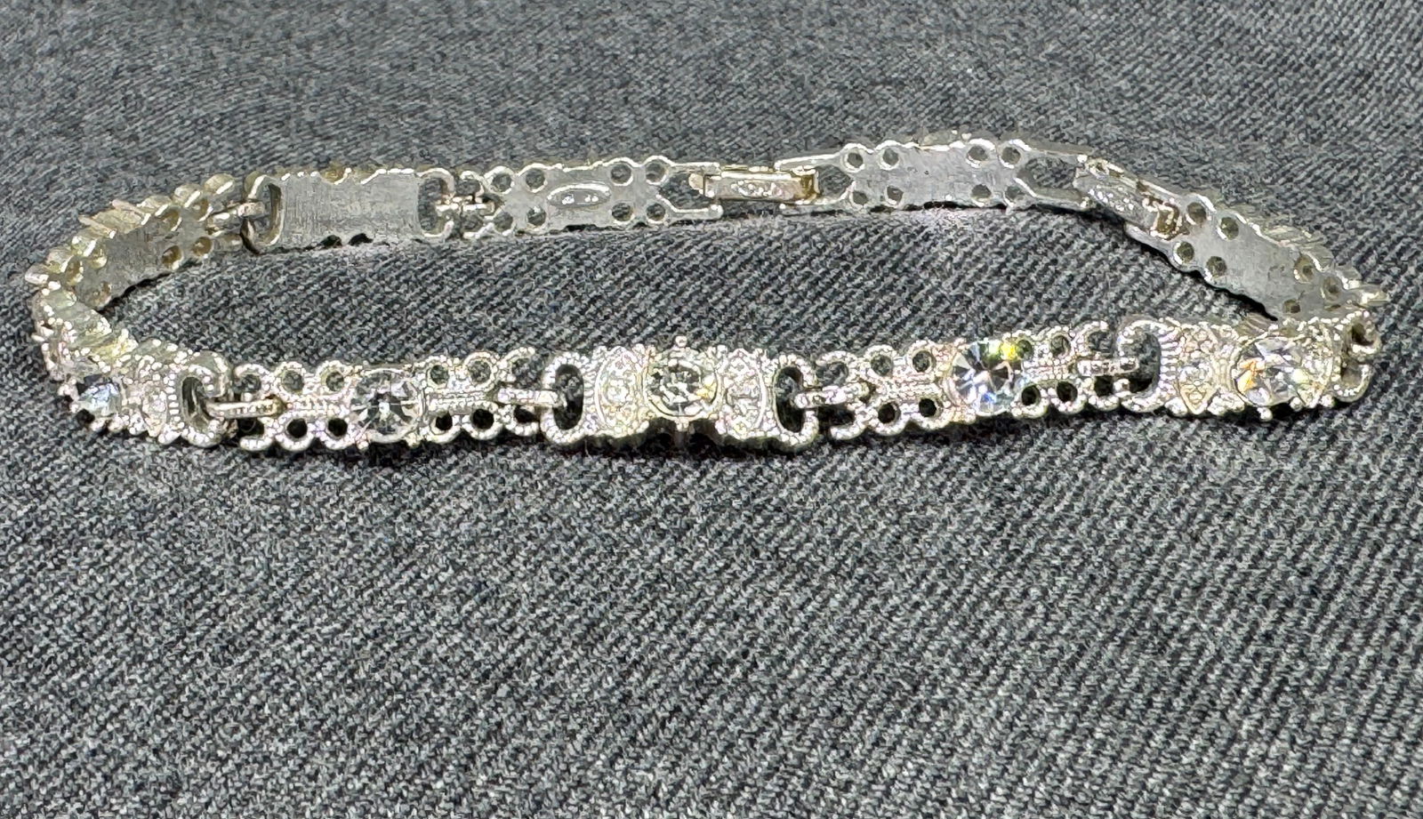 Vintage Avon NR clear crystals silvertone metal double clasped bracelet (1 of 10)
