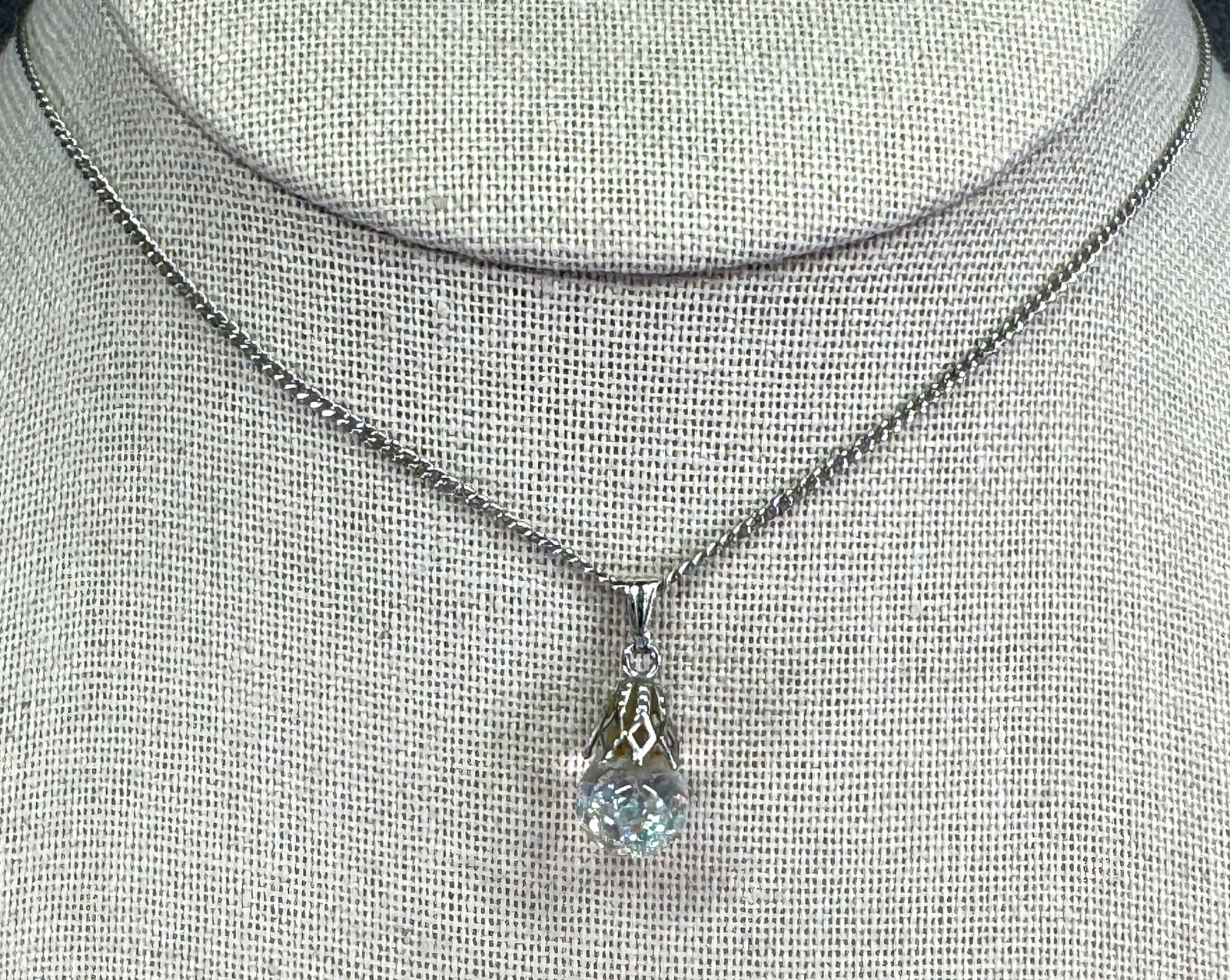 Vintage moving crystals in liquid inside a clear glass drop sterling pendant with chain (1 of 7)