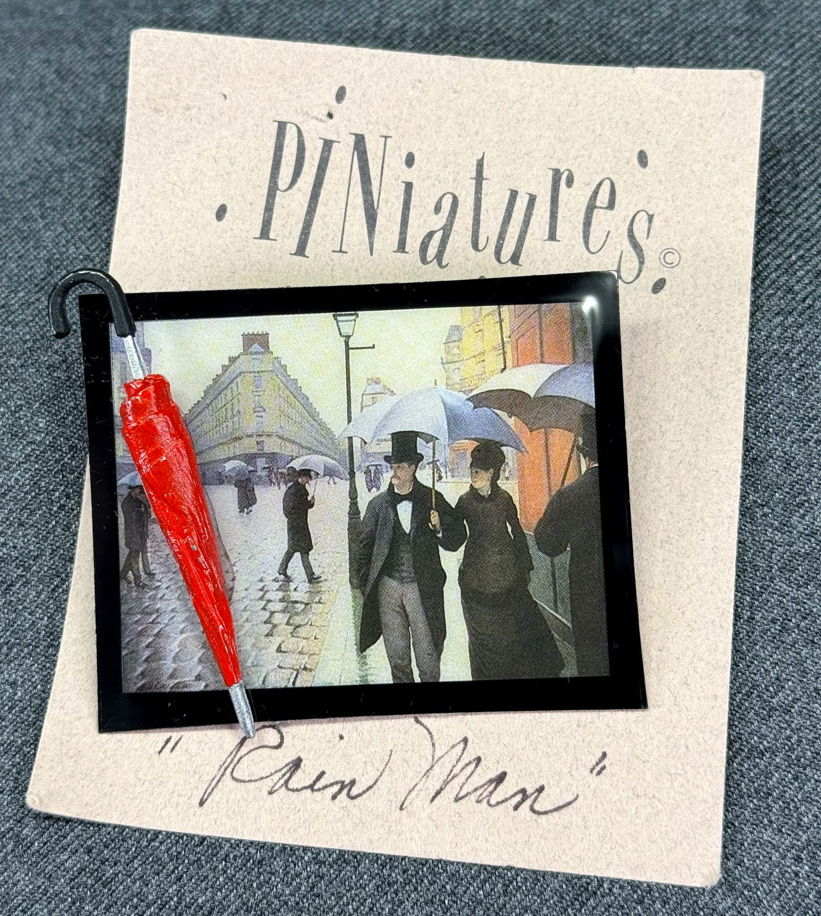 Artsy "Rain Man" miniature umbrella celluloid Rainy Day by Gustave Caillebotte brooch pin (1 of 6)