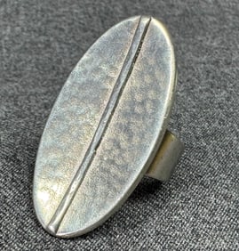Modernist style hammered silver-toned oversized adjustable ring