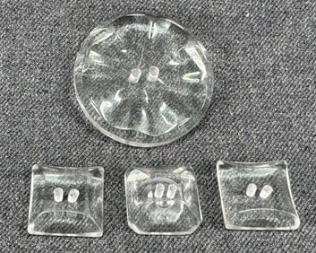 Vintage assorted clear lucite buttons. Lot of 4.
