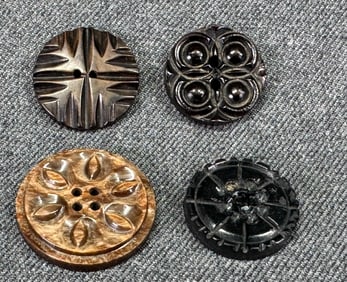 Vintage assorted carved galalith buttons. Lot of 4