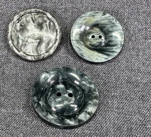 Vintage assorted marbled gray galalith buttons. Lot of 3