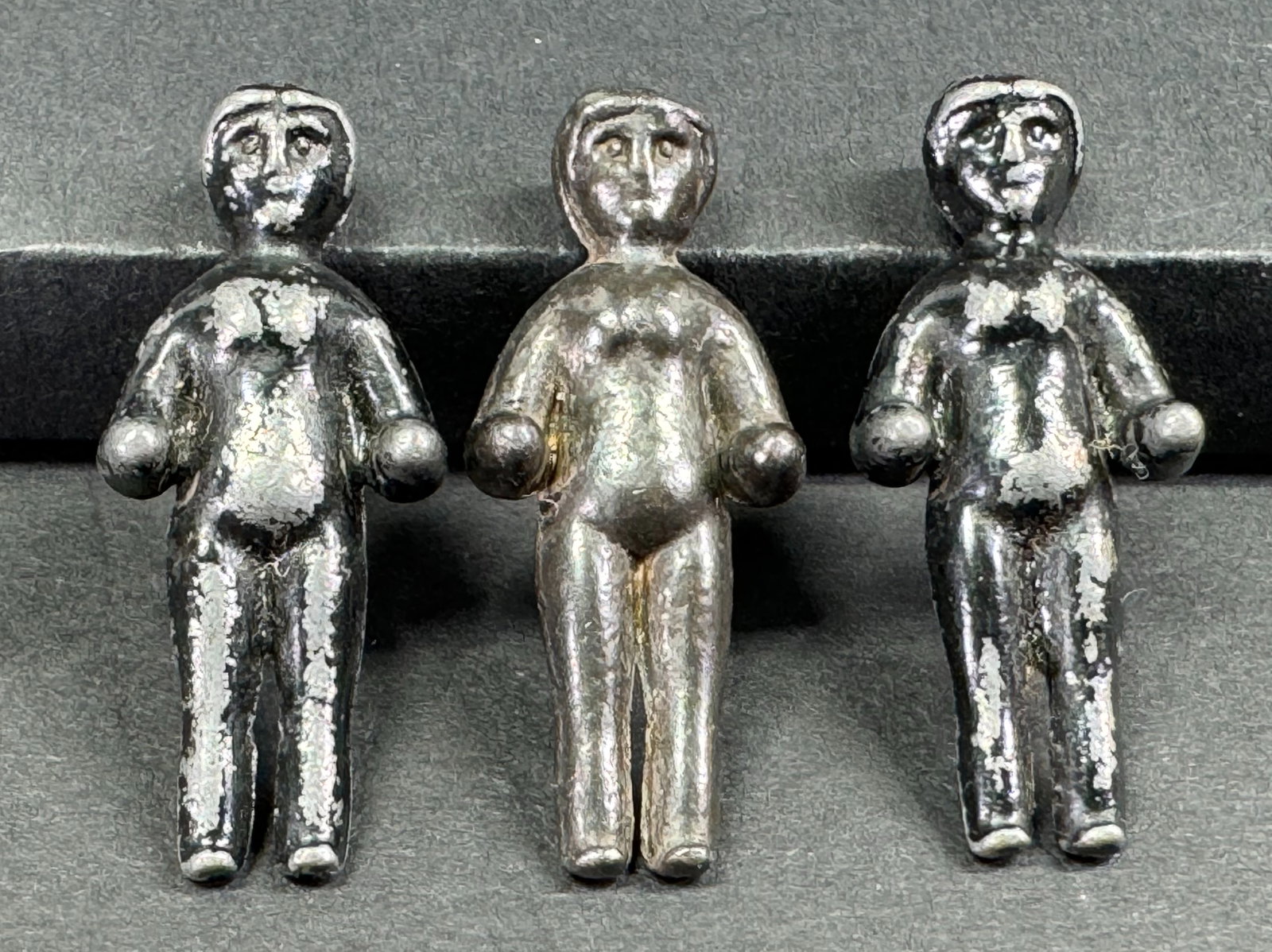 Vintage painted black metal frozen Charlotte style miniature tiny dolls. Lot of 3. (1 of 4)