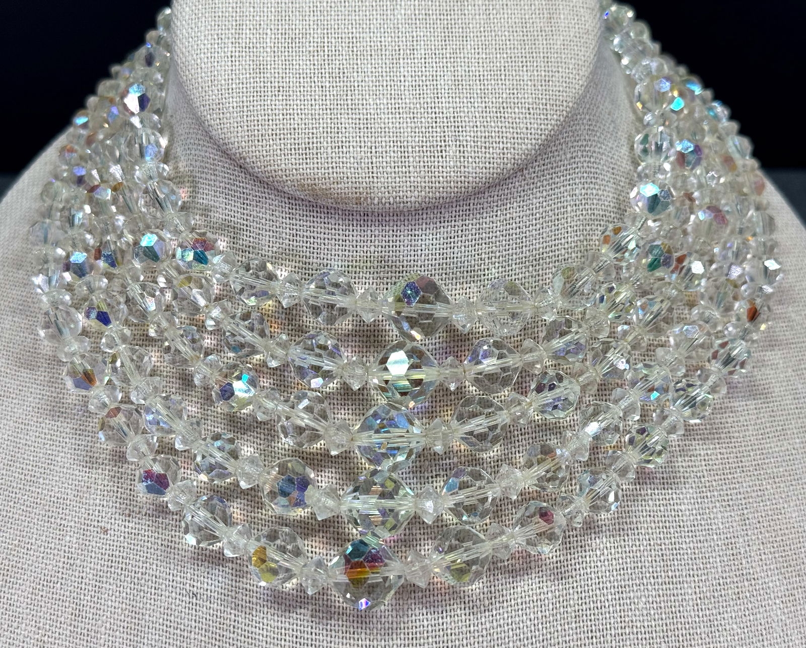 Vintage 60s AB faceted graduated crystals five strands collar bib necklace. Jelewed clasp.: Vintage 60s AB faceted graduated crystals five strands collar bib necklace. Jelewed clasp.Unmarked For measures please refer to the pictures taken with a measuring tape. Weight: 115 Grams. This is a N