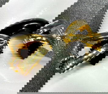 Vintage 80s black plastic goldtone metal bracelet: Vintage 80s black plastic goldtone metal bracelet. For measures please refer to the pictures taken with a measuring tape. Weight: 38 Grams. IN HOUSE Estimated* SHIPPING & HANDLING COST WITHIN THE U.S.