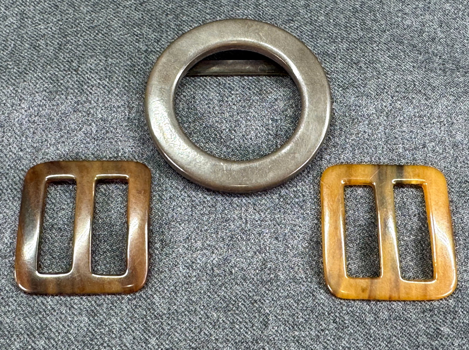Vintage celluloid jewelry or belt sliders: Vintage celluloid jewelry or belt sliders. Unmarked, For measures please refer to the picture taken with a measuring tape. Weight: 12 Grams. IN HOUSE Estimated* shipping and handling cost within the U