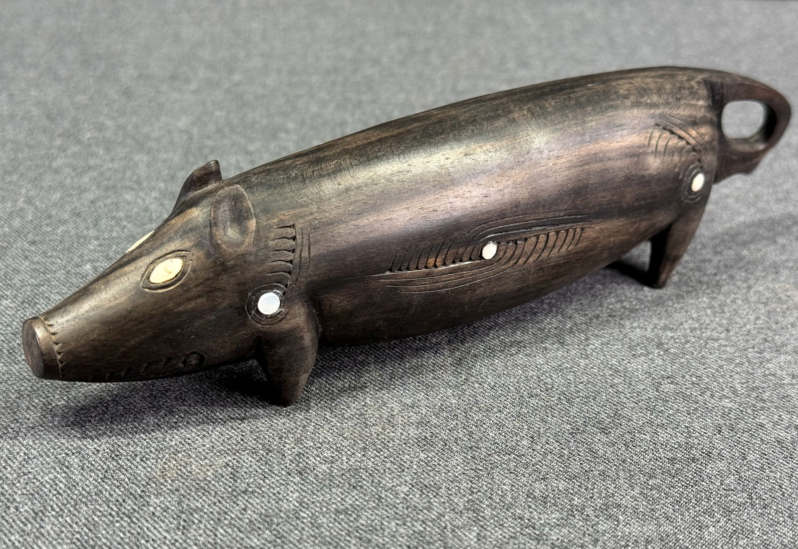 Trobriand Islands Massim Pig Figure. Wood, mother of pearl inlay. (1 of 12)