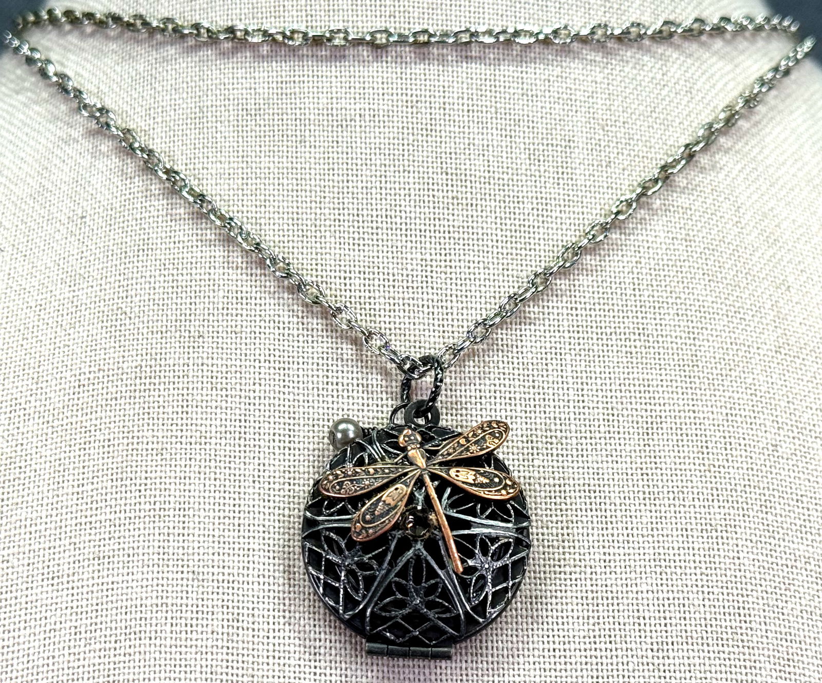 Dragonfly filigree top locket necklace with chain strap necklace: Dragonfly filigree top locket necklace with chain strap necklace. Unmarked. For measures please refer to the pictures taken with a measuring tape. Weight: 15 Grams. IN HOUSE Estimated* SHIPPING & HAND