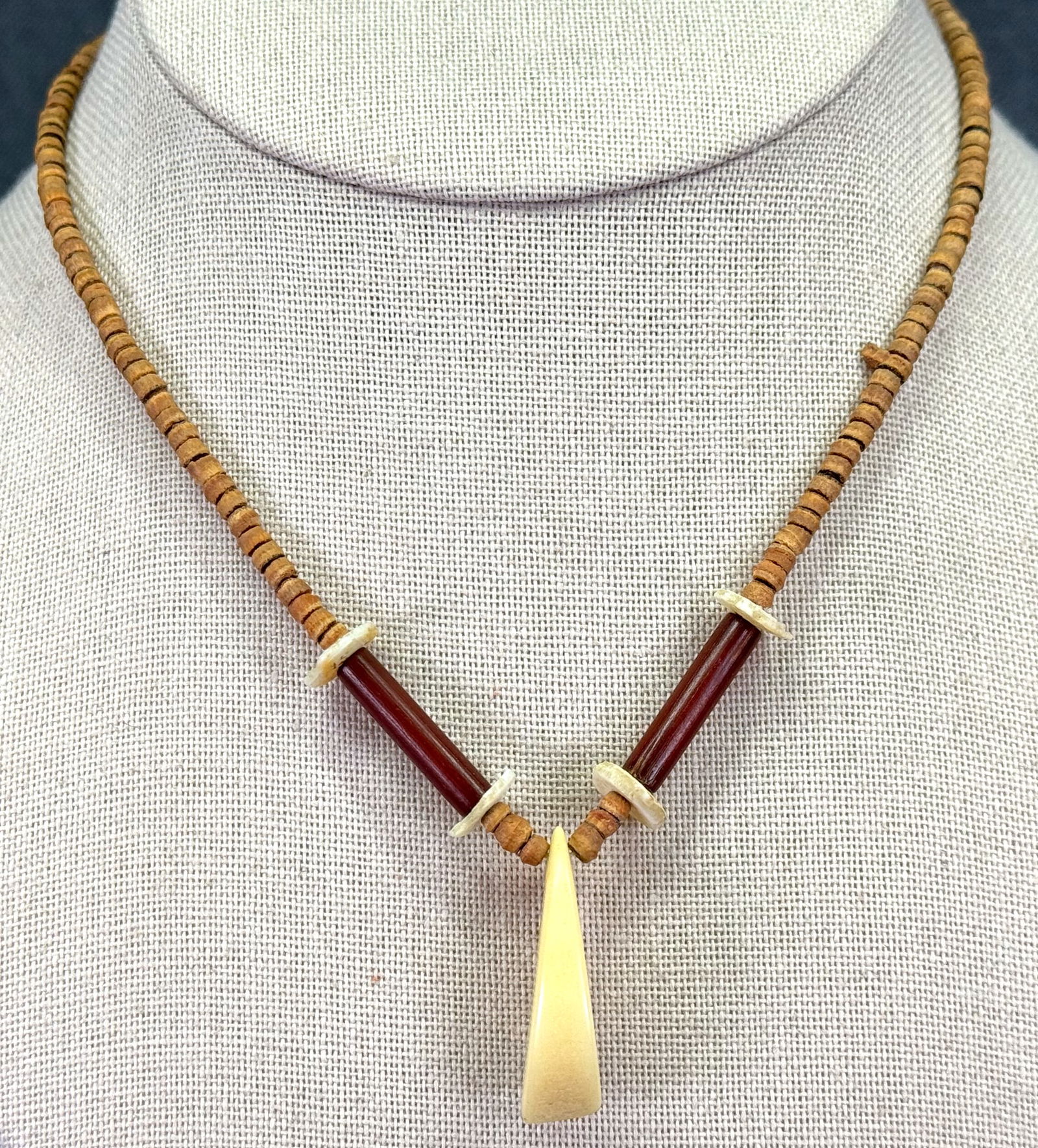 Vintage ethnic wood, bone bamboo and shell beaded collar necklace: Vintage ethnic wood, bone bamboo and shell beaded collar necklace. Ummarked. For measures please refer to the pictures taken with a measuring tape. Weight: 6 Grams. IN HOUSE Estimated* SHIPPING & HAND