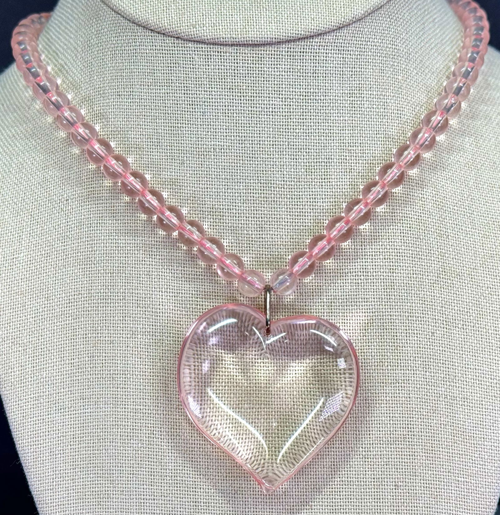 Vintage Vogue Lucite Plastic Puffy Heart Beaded Necklace: Vintage Vogue Lucite Plastic Puffy Heart Beaded Necklace. Marked. For measures please refer to the pictures taken with a measuring tape. Weight: 24 Grams. IN HOUSE Estimated* shipping and handling cos