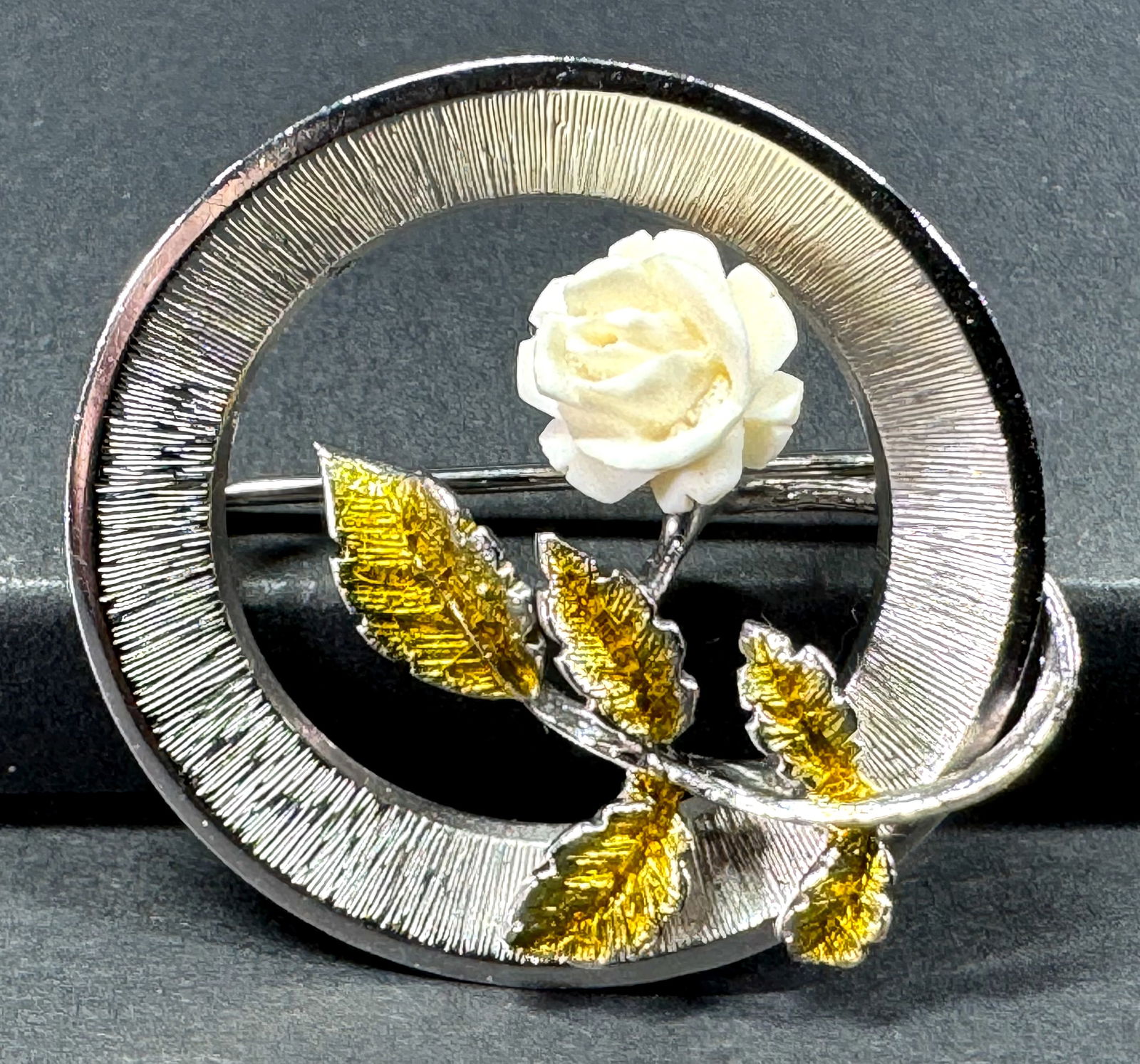 Vintage Beau Sterling carved bone rose flower enamel leaves silver pin brooch.: Vintage Beau Sterling carved bone rose flower enamel leaves silver pin brooch. Marked. For measures please refer to the pictures taken with a measuring tape. Weight: 4.53 Grams. This is a NO RESERVE A